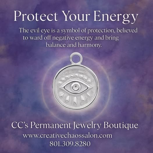 A promotional image for CC's Permanent Jewelry Boutique featuring a silver pendant with an engraved eye symbol, set against a purple and blue background, with white text about protecting energy and the eye as a symbol of protection.