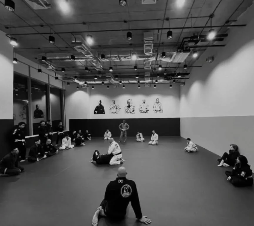 Layer 3: The CHEK view:

CHEK (Corrective Holistic Exercise Kinesiology) approaches training as a whole-body system, building everything around fundamental patterns, prioritizing posture and breathing over heavy loading, and treating recovery as part