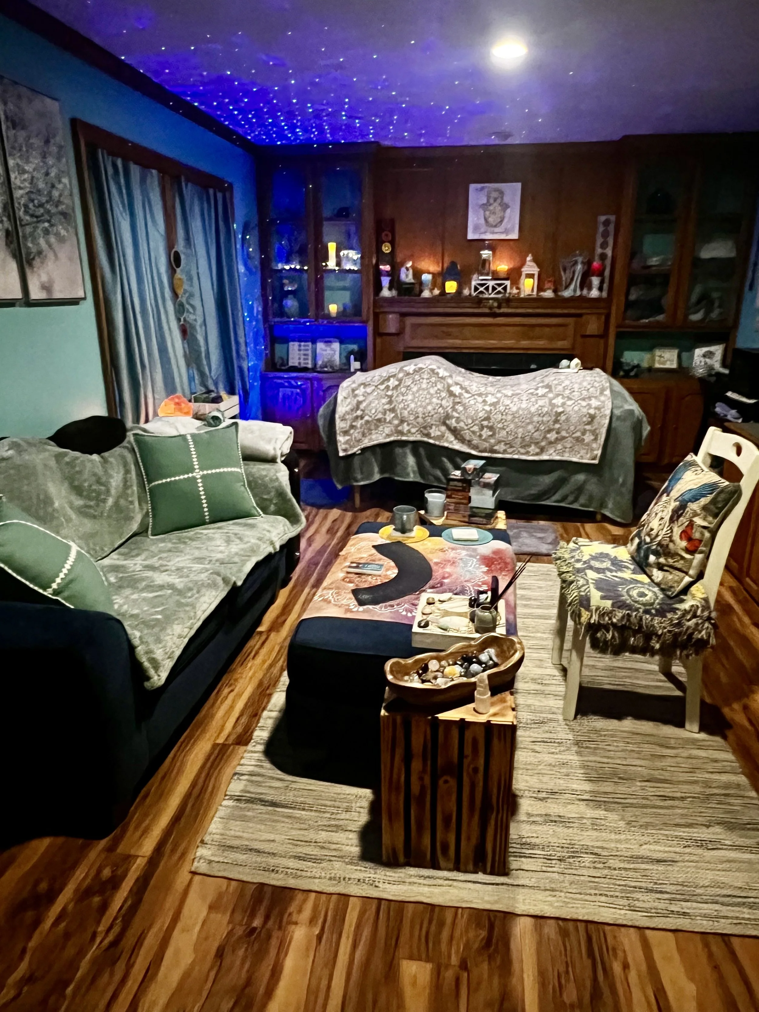 Reiki studio with heated bed and tarot card reading for intuitive insight.