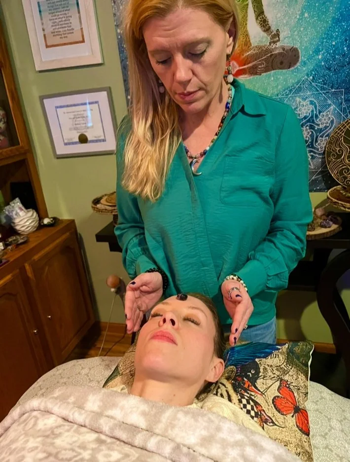 Reiki Master channeling Reiki for client in Buffalo, NY