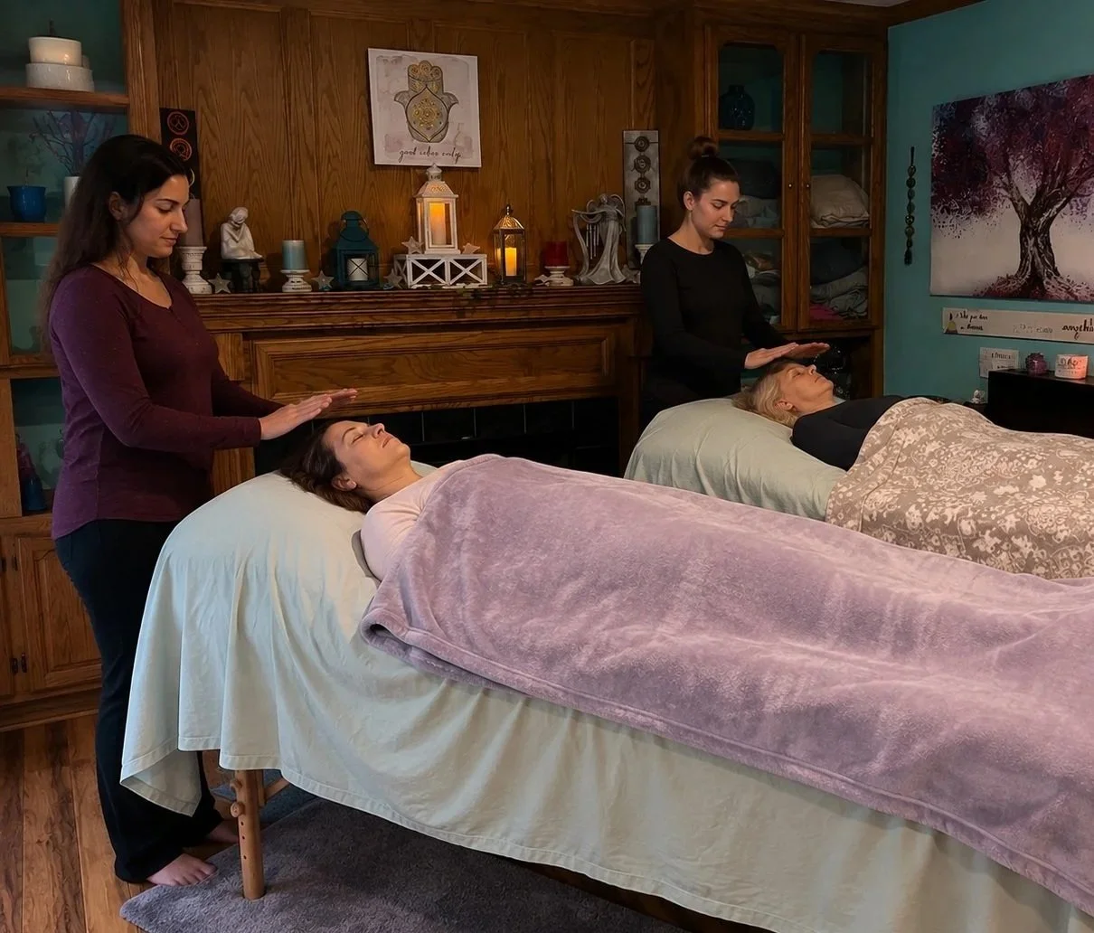 Reiki Level 2 Certification Class with students practicing Reiki after their attunement at Lavender Healing and Wellness in Buffalo, NY