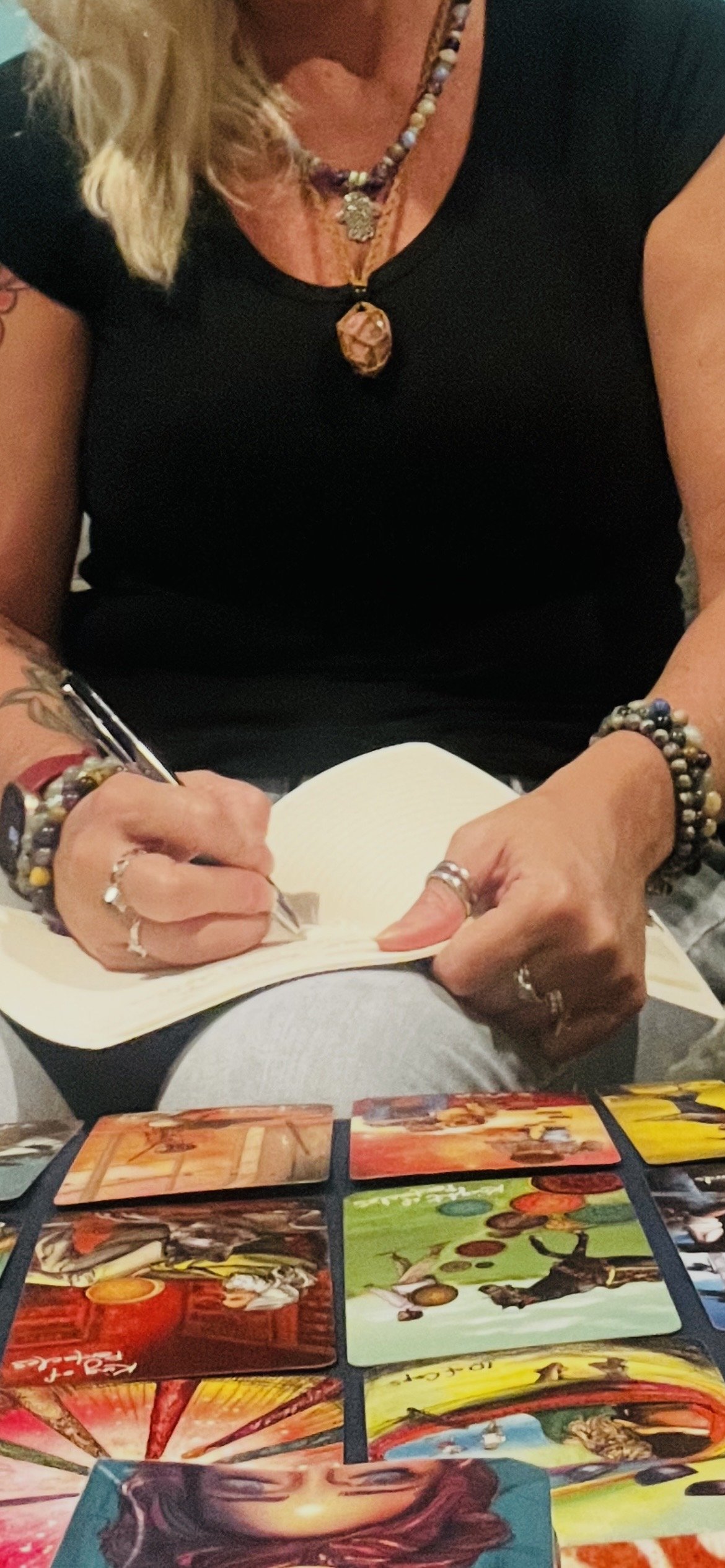 Reiki Master Teacher, Melissa Eaton journaling tarot guidance for the day.