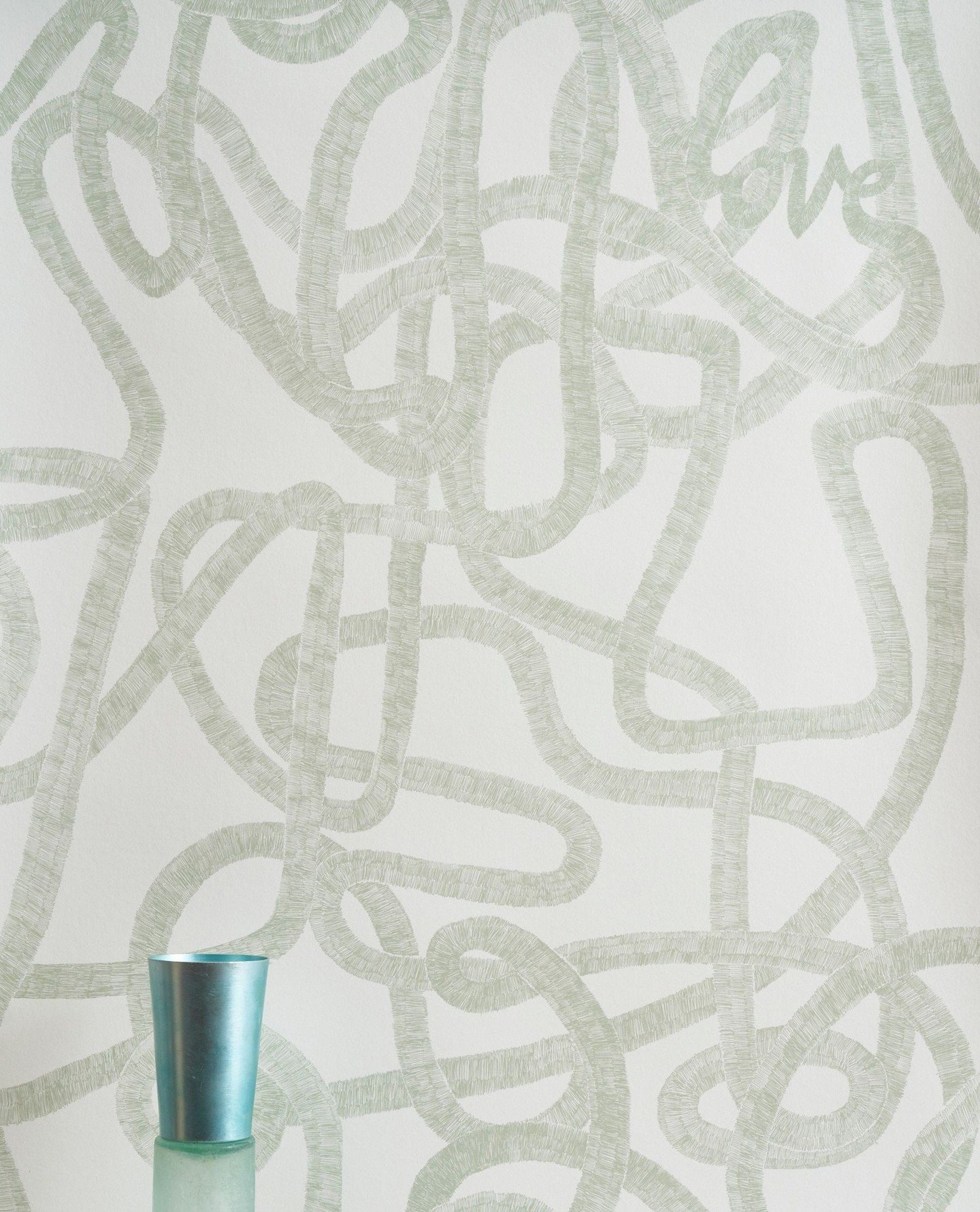 The 'Lovescape' of the past week...⁠
⁠
1. Lovescape wallpaper in pale sage on white.⁠
2. Me drawing the design, process.⁠
3. Lovescape wallpapers, both with pale sage backgrounds.⁠
4. Love heart leaf.⁠
5. Lovescape wallpaper in moss on white⁠
6. My d