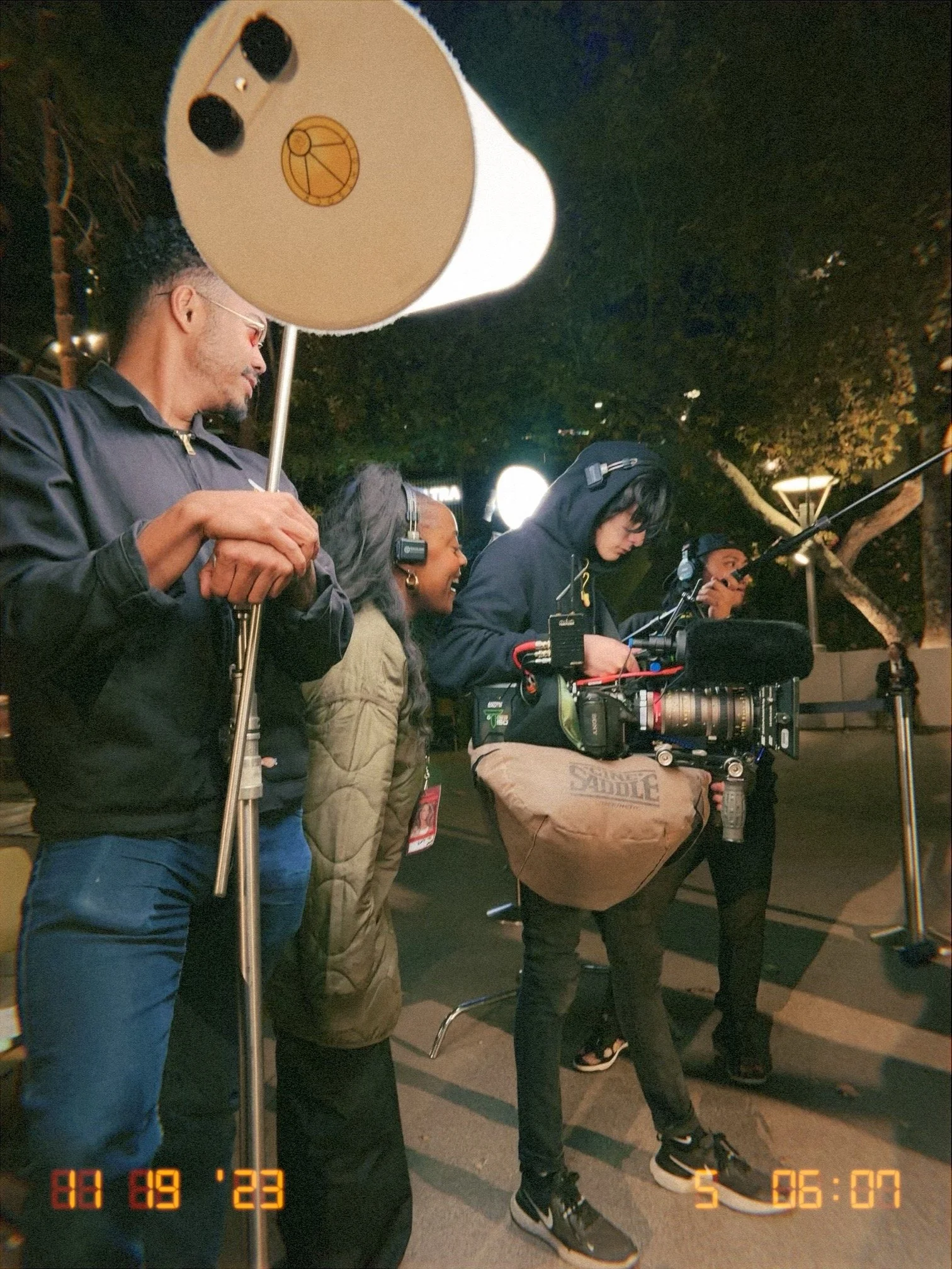 Dolapo Sangokoya and film crew on set filming "All I Want for Christmas Is You" (Festive Lambs Edition) Music Video 