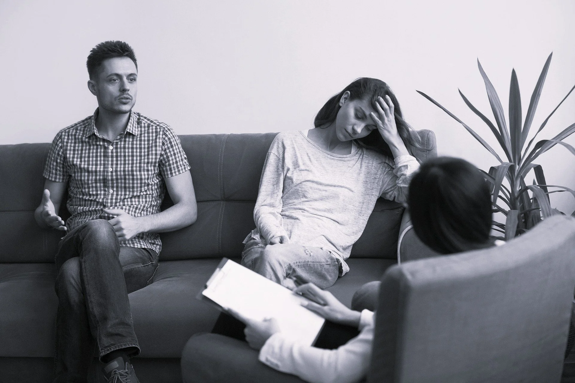 Black and white photo of couples in therapy discussing with therapist Riverside CA