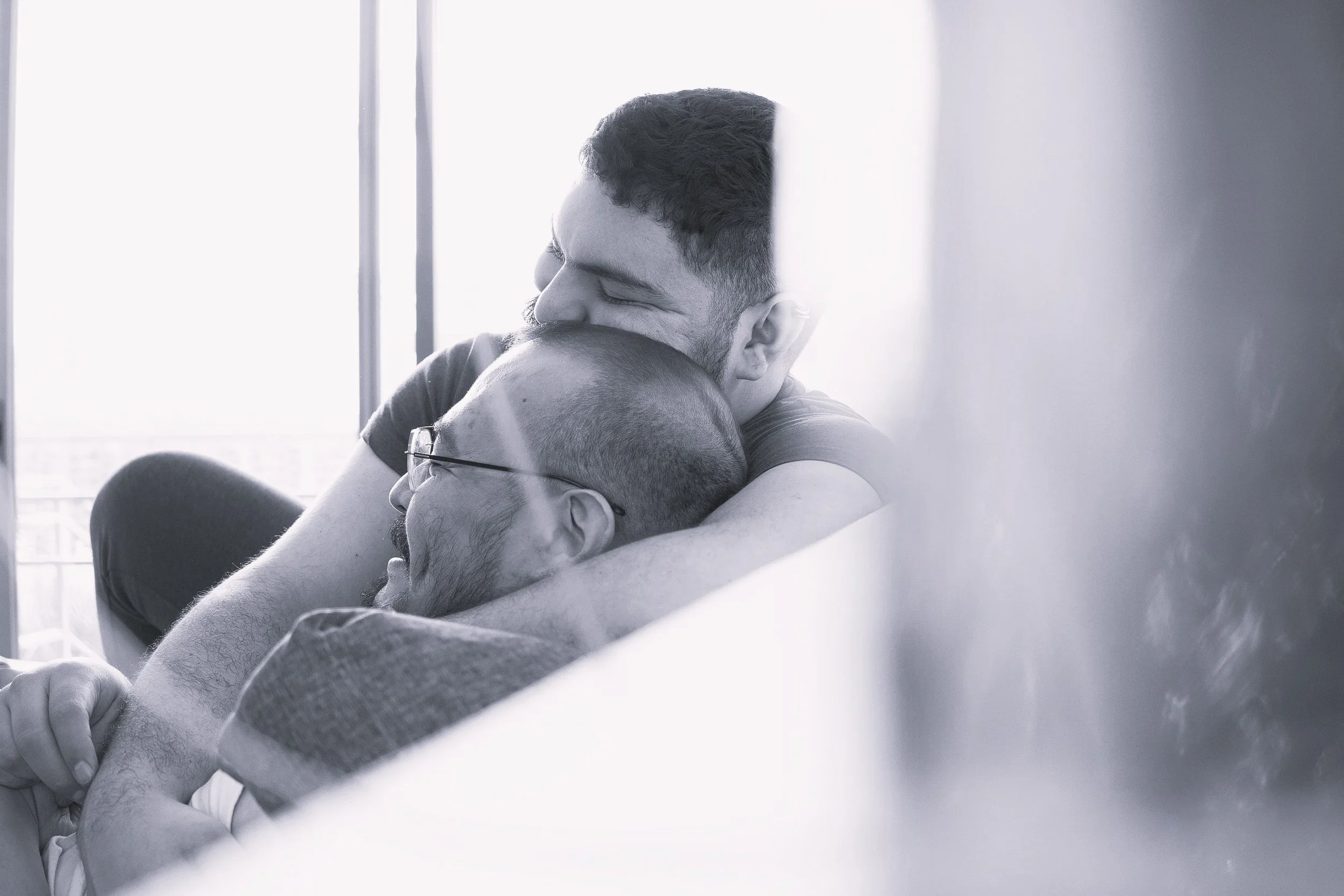 Black and white photo of couple hugging each other Couples counseling in California