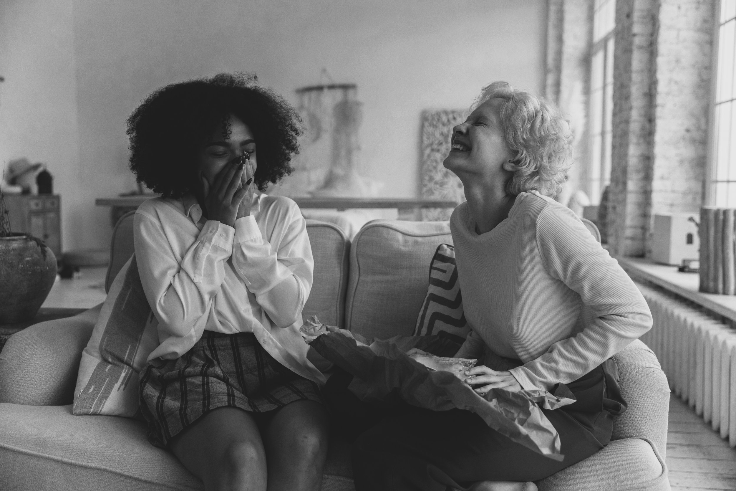 couple laughing together at a joke