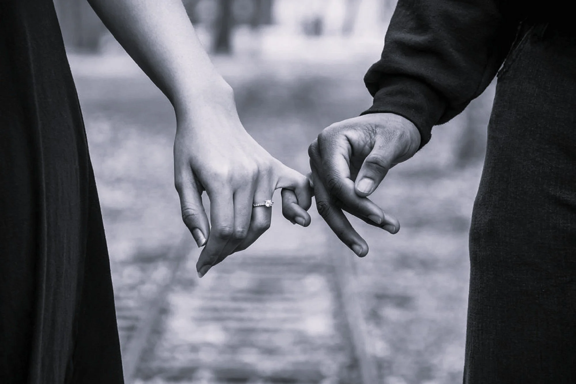 Couple holding hands