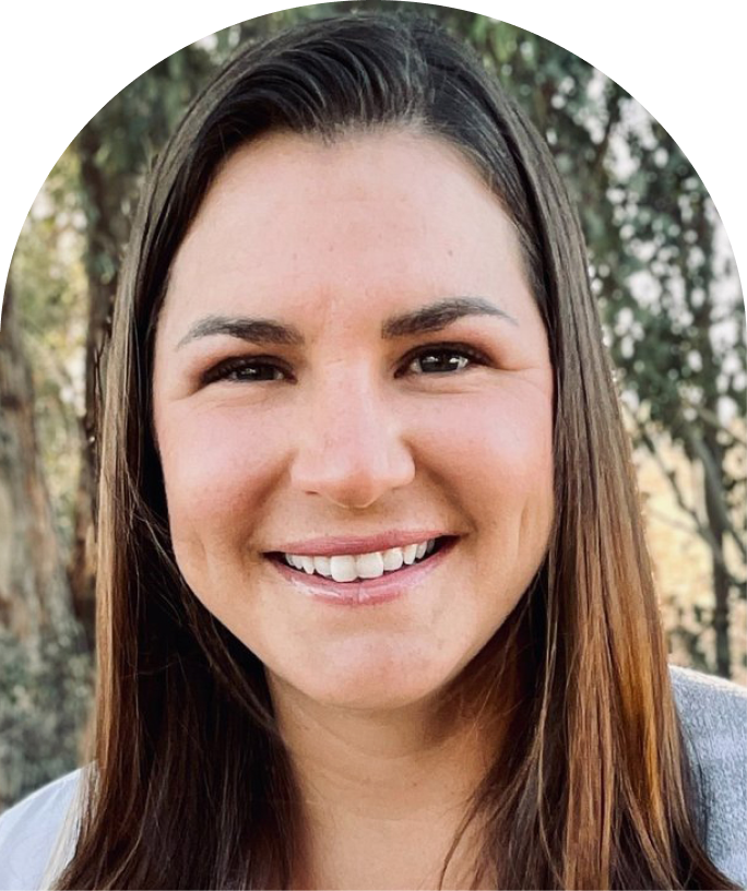 Headshot of Jackie Fliestra with tree background