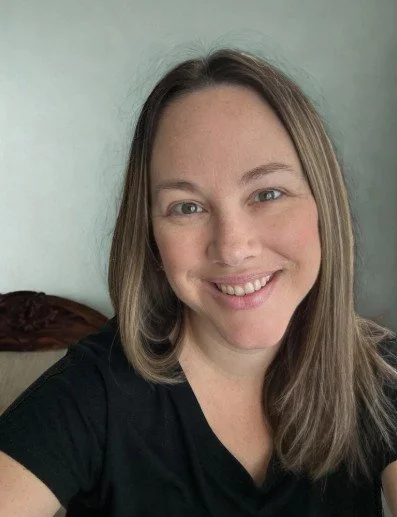 headshot of Alexis Johnson, LMFT smiling at the camera. She is a couples counselor in Riverside CA