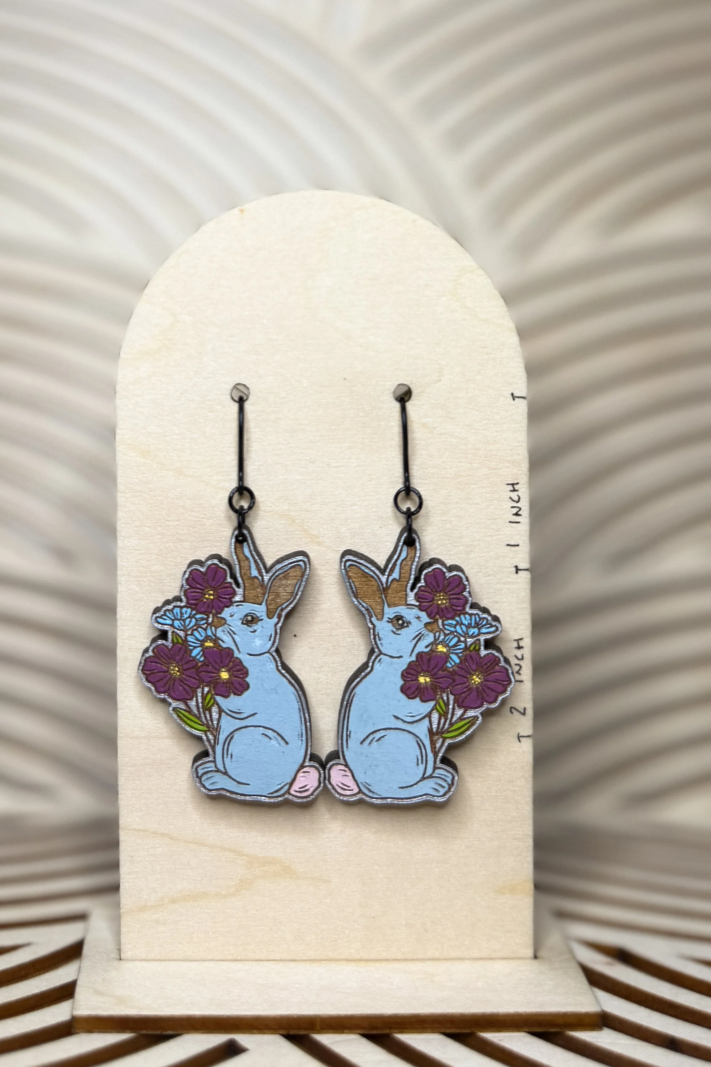 Rabbit Holding Flowers