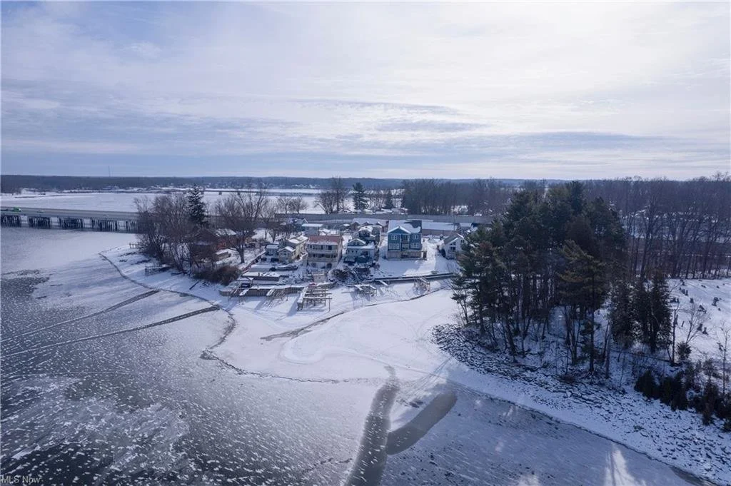 Imagine ending your week here.

Direct lake access. Deck space to unwind. A hot tub under the stars. And just beyond the shoreline, a second home included in the package.

If you owned this, would this be your weekend escape or your full-time lifesty