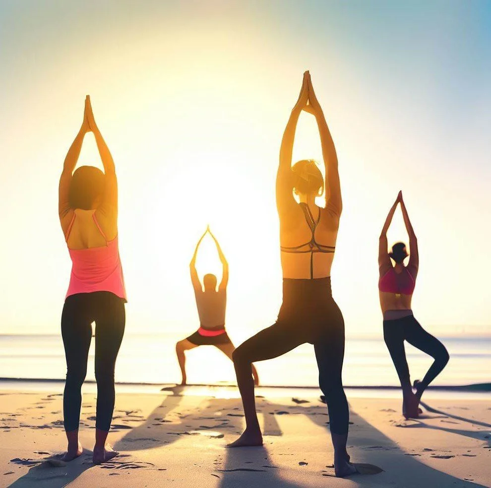 Yoga practitioners on a serene beach.
