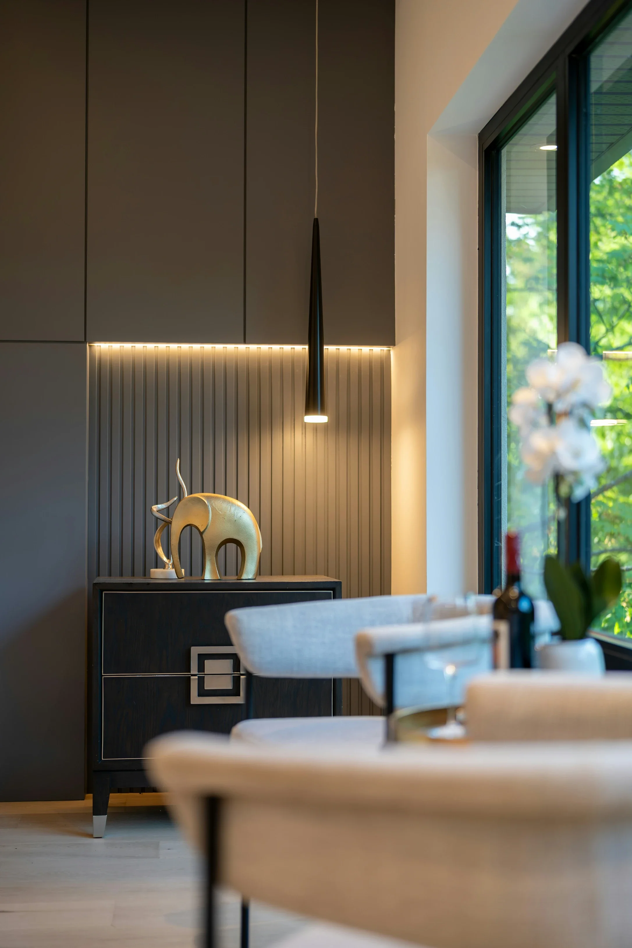 A Wood Slat Wall Panel from WoodUpp Gives the TV Wall Depth and Warmth