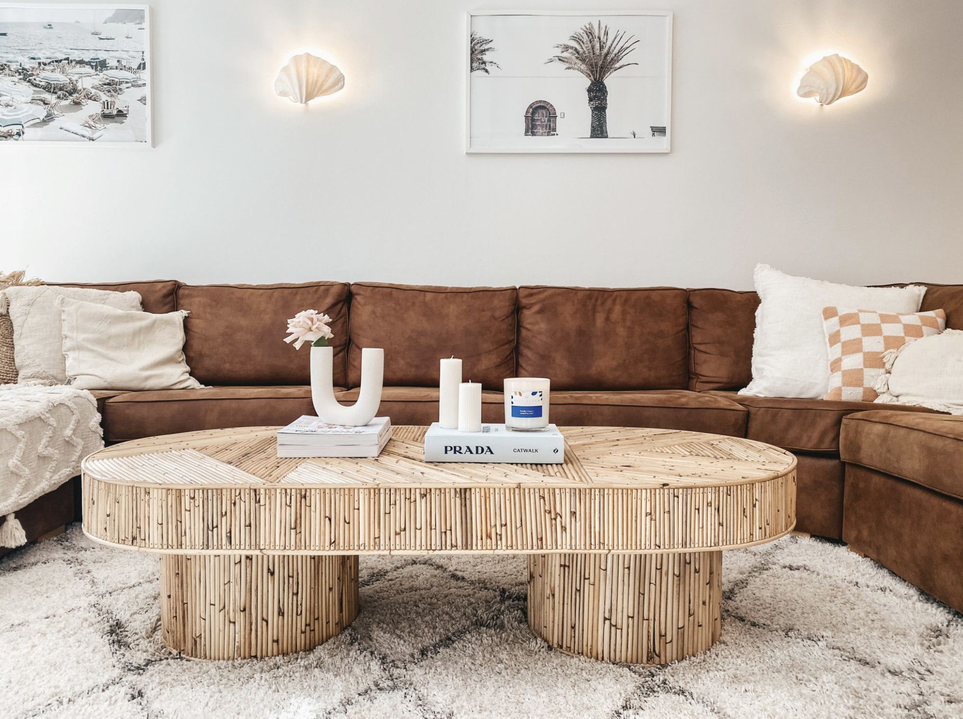 Rust coloured lounge with bamboo coffee table