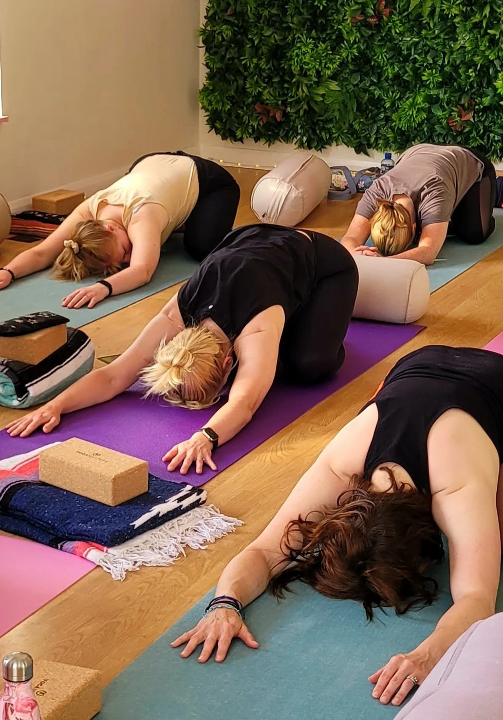 Students practising Slow Flow yoga with calm, gentle movement at SoulTribe Yoga Studio in Pocklington East Yorkshire.