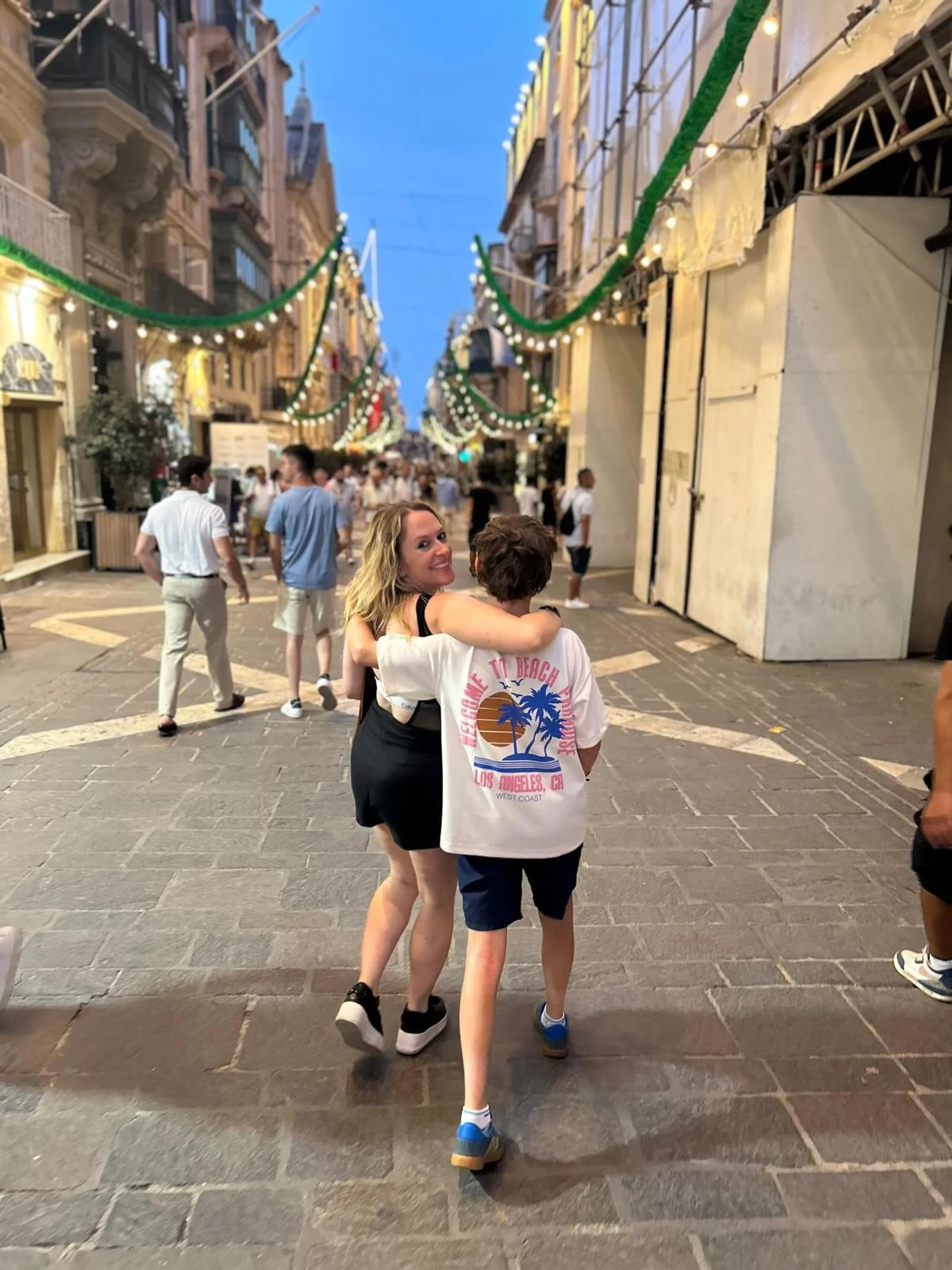 Valletta on festa night. My arm round my youngest, streets absolutely heaving.

I run a studio, teach the whole of the timetable myself, and I&rsquo;m building an online world from scratch - some days the whole thing feels like too much to hold. 

Fo
