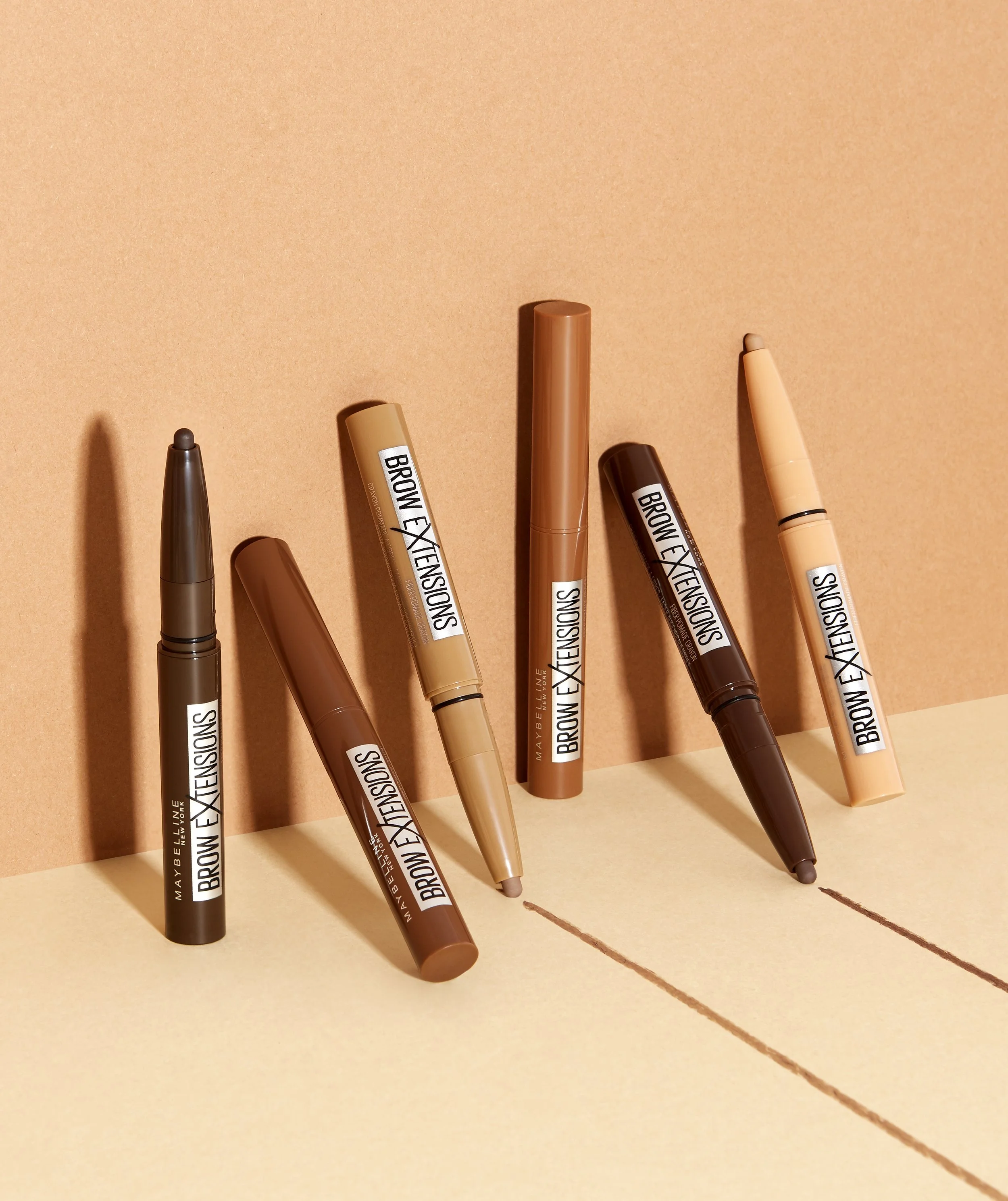 Still life beauty shoot of Maybelline brow pencils