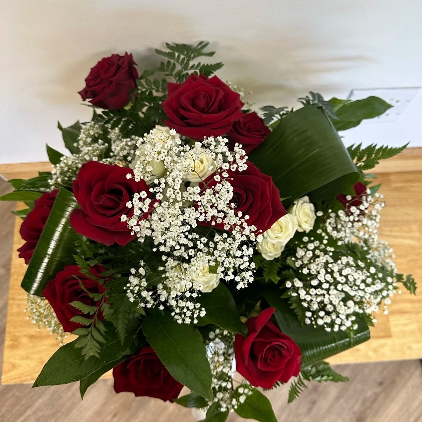 Wine and Pearl Wrapped Arrangement.