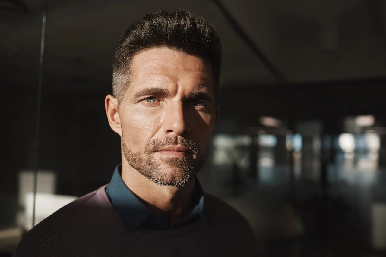 close-up-shot-of-a-man-in-brown-shirt