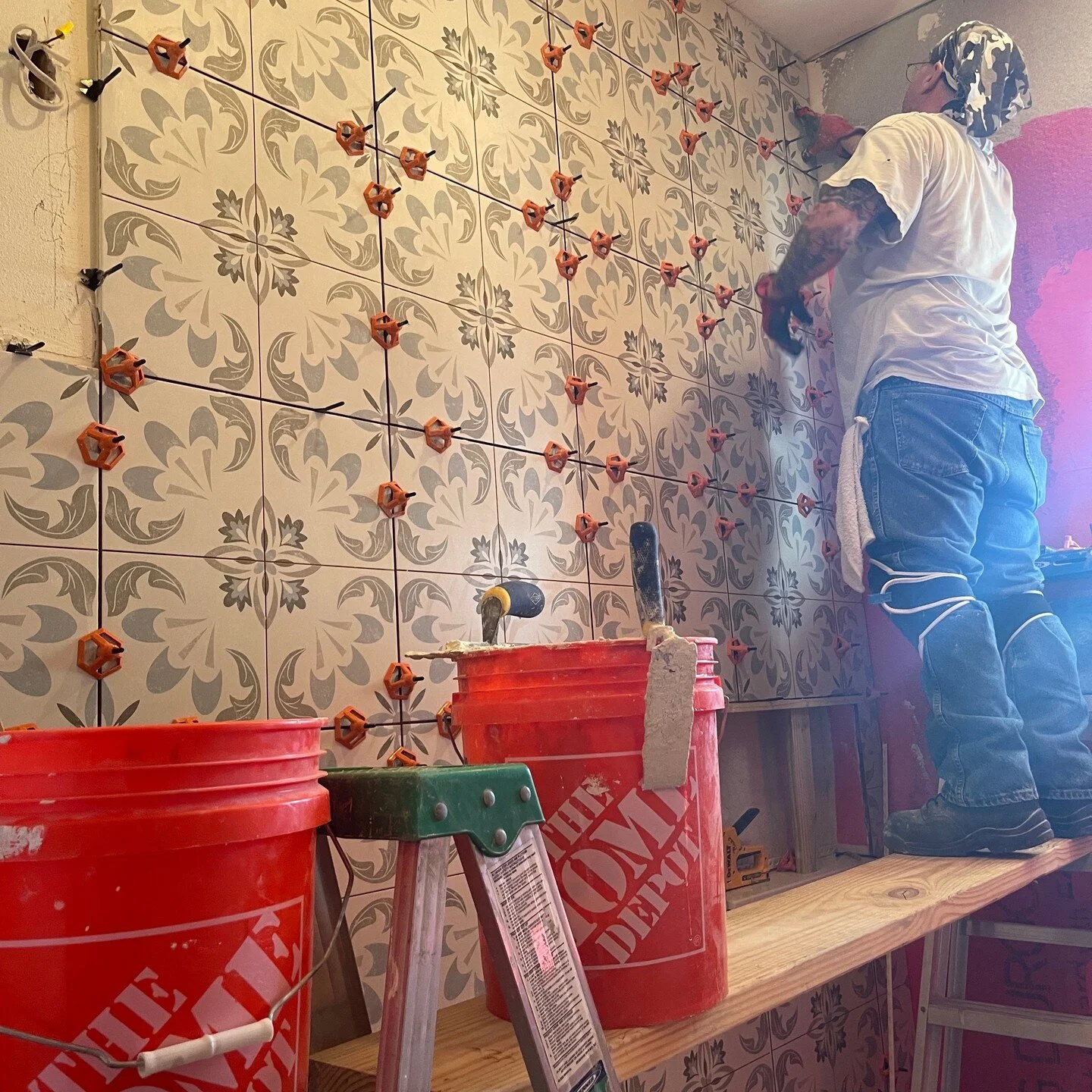 Tile isn't just for floors... #bathroomdesign #bathroomremodel #tile #tiledesign #concretetiles #gray #graytile #decorativetile #construction #inprogress #allinadayswork