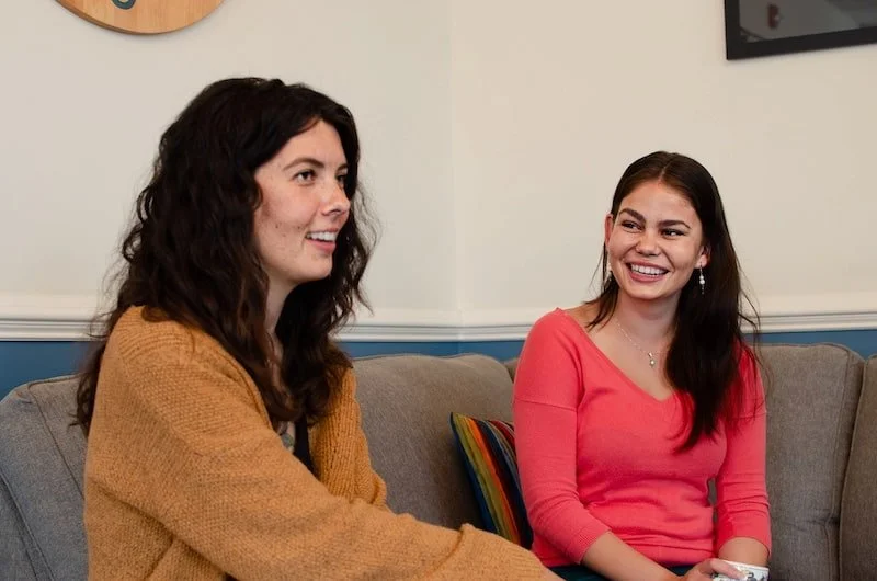 two people in a circle session