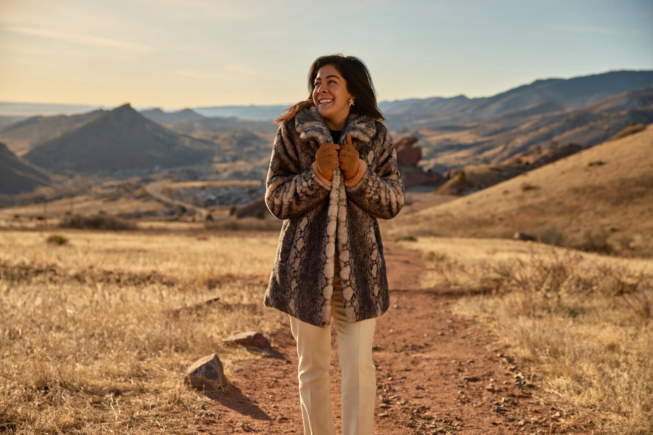 Fur Coat Against a Golden Rockies Landscape