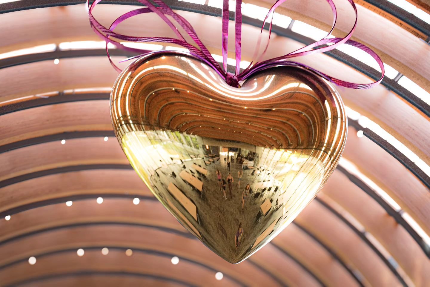 One of our imaginative young photographers took this stunning shot of a gold heart hanging from the ceiling. The reflection reveals our campers, cameras in hand, exploring and capturing their unique perspectives. This moment beautifully illustrates t