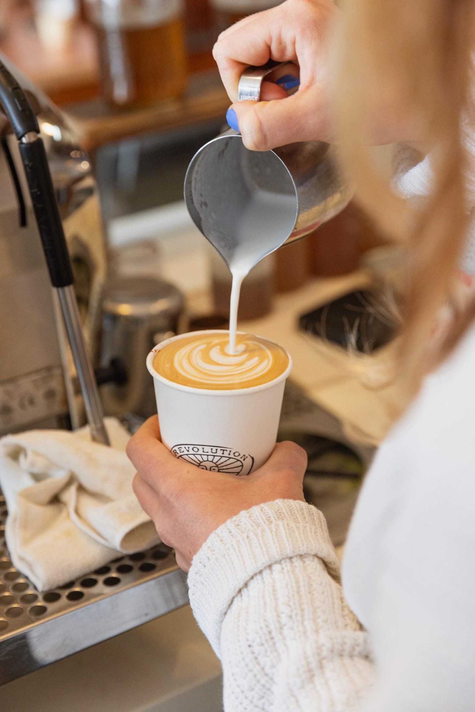 Revolution Roasters Pouring Espresso.jpg