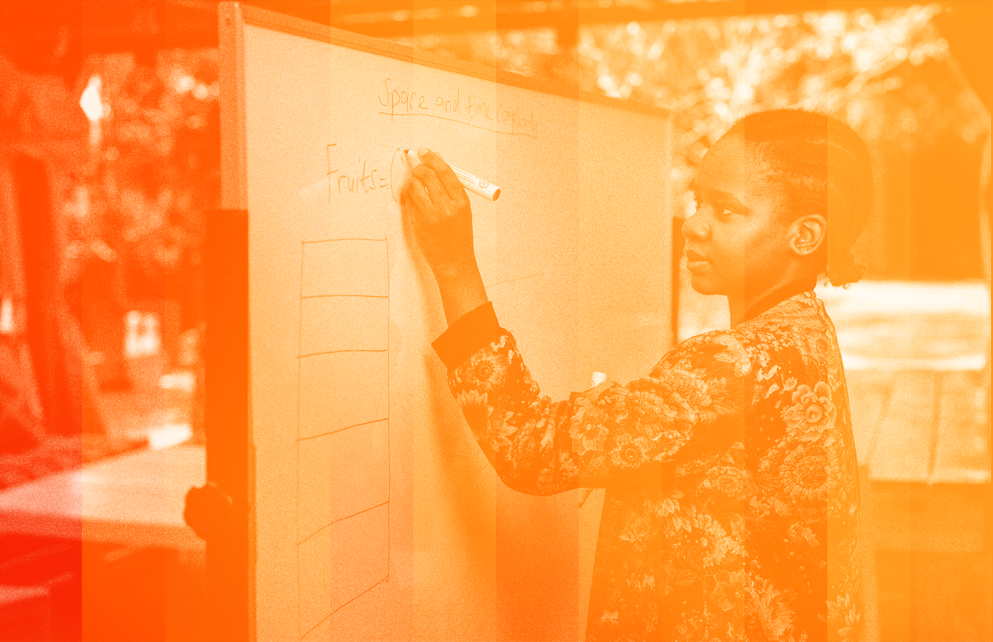 Young Woman Writing on a Whiteboard