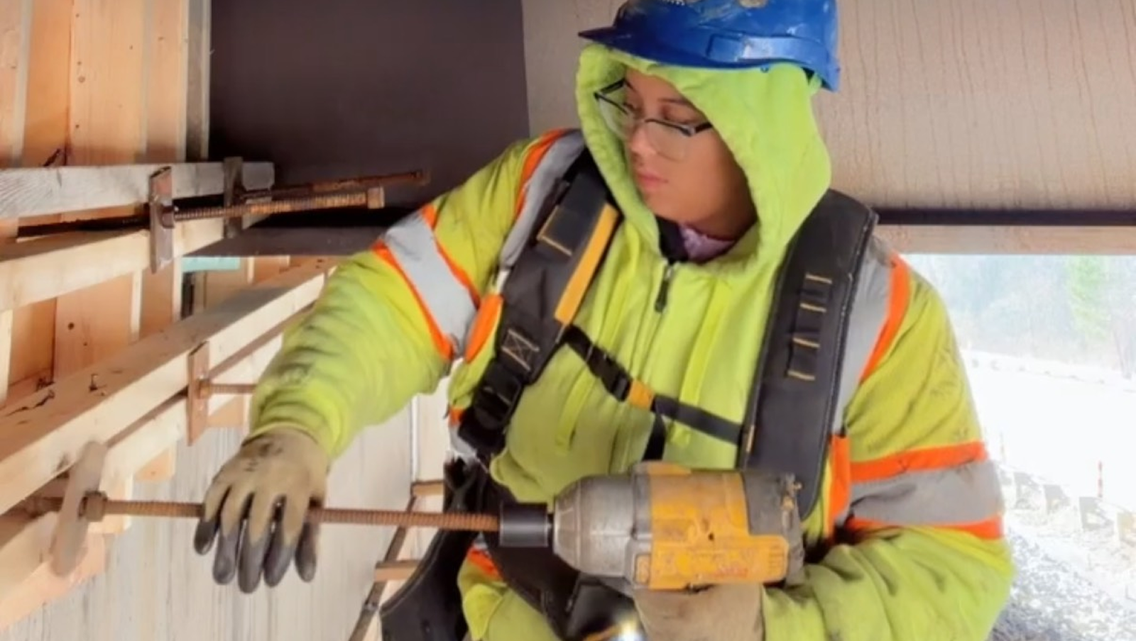 Construction worker drilling