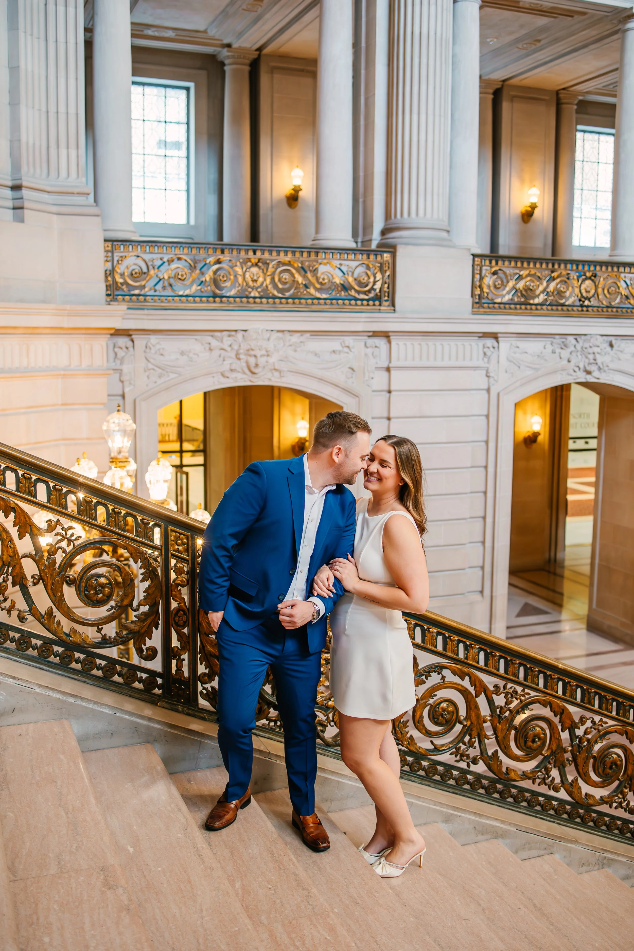 sf-cityhall-engagement-couple-stairs