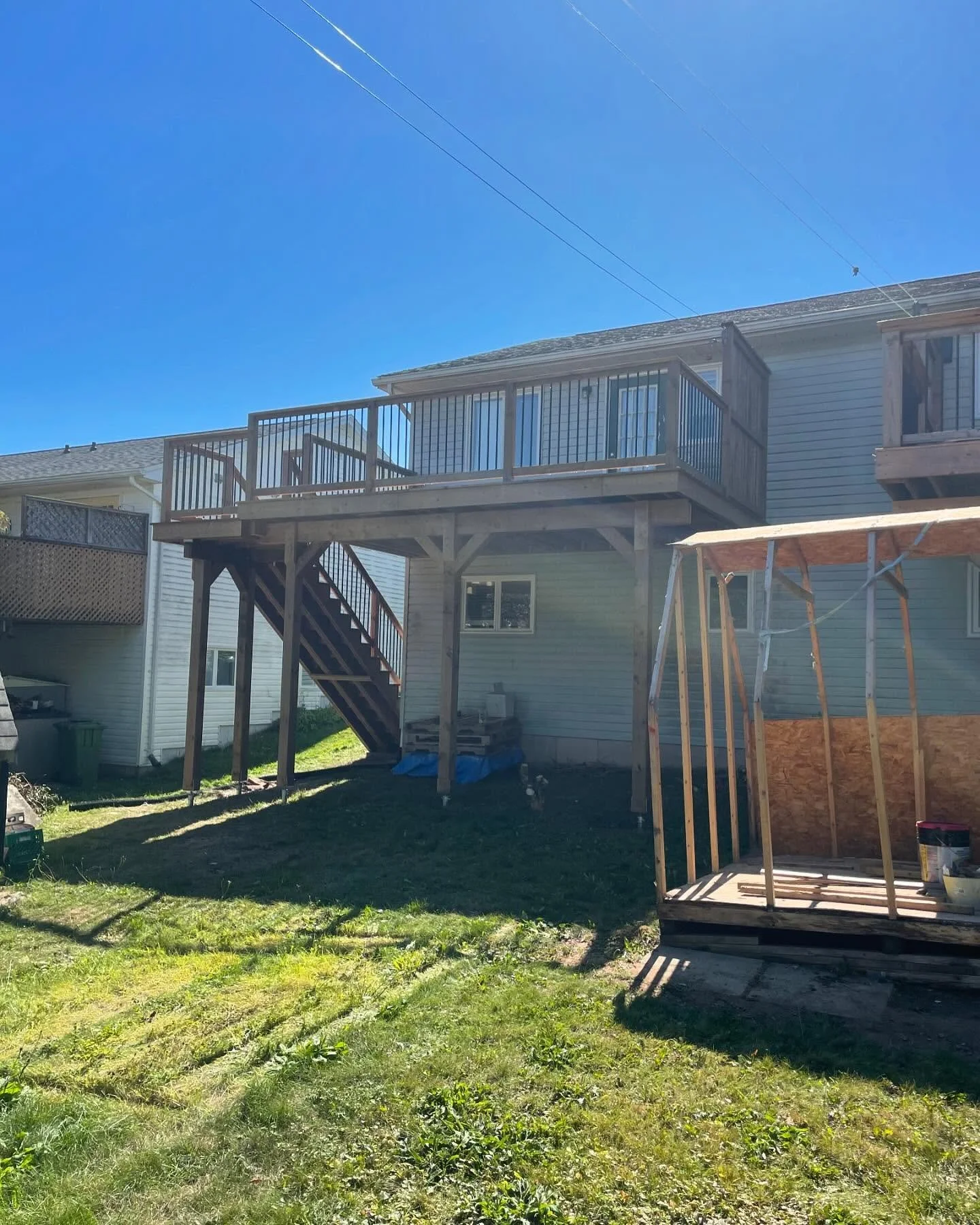 Finished pictures of the very tall deck.