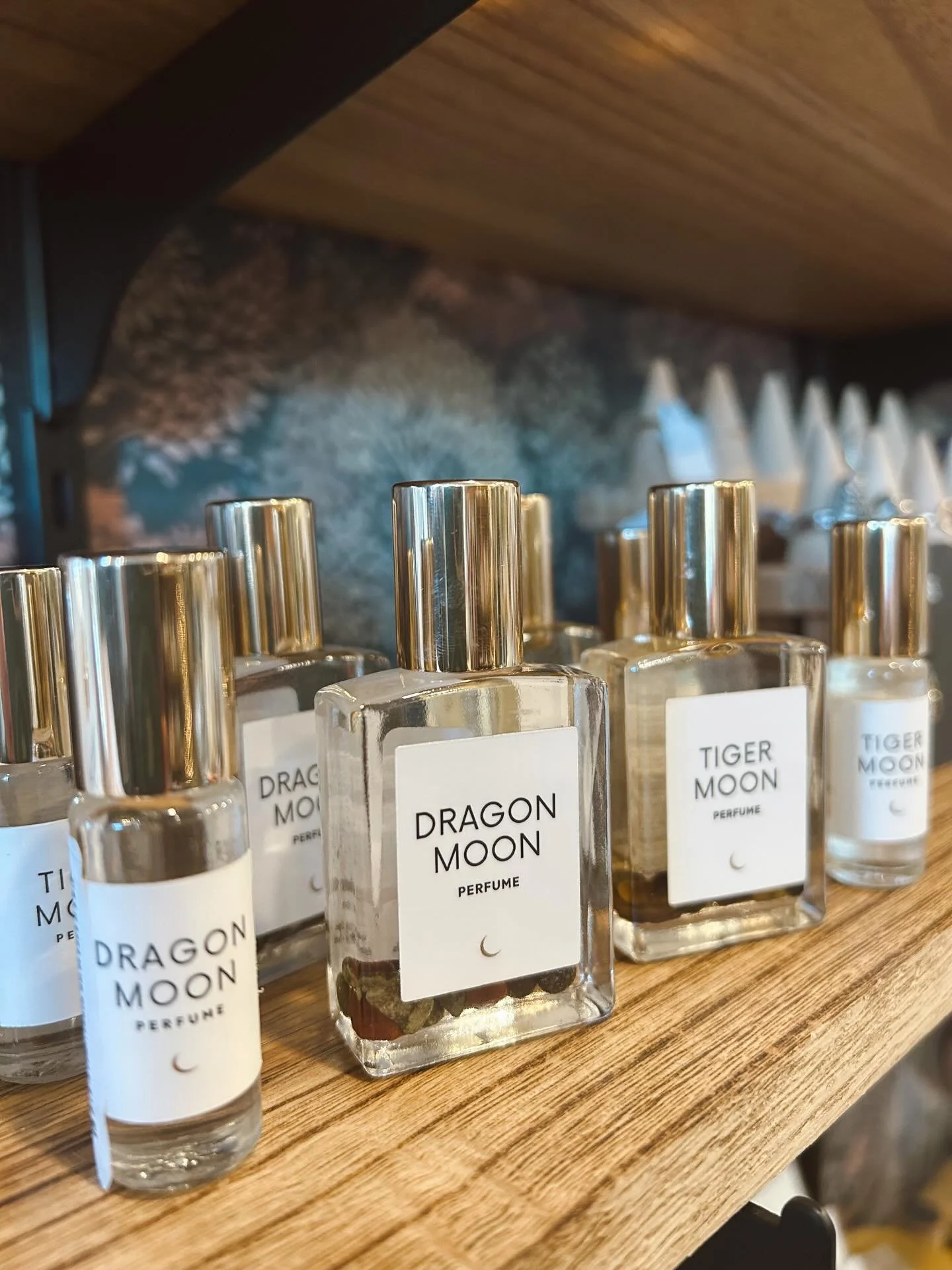 Last night my daughter and I were leaving the grocery store and we caught a glimpse of the full moon coming up thru the trees. I drove us around in circles in the parking lot in an effort to get at the right angle where we could snap a photo ~ it was