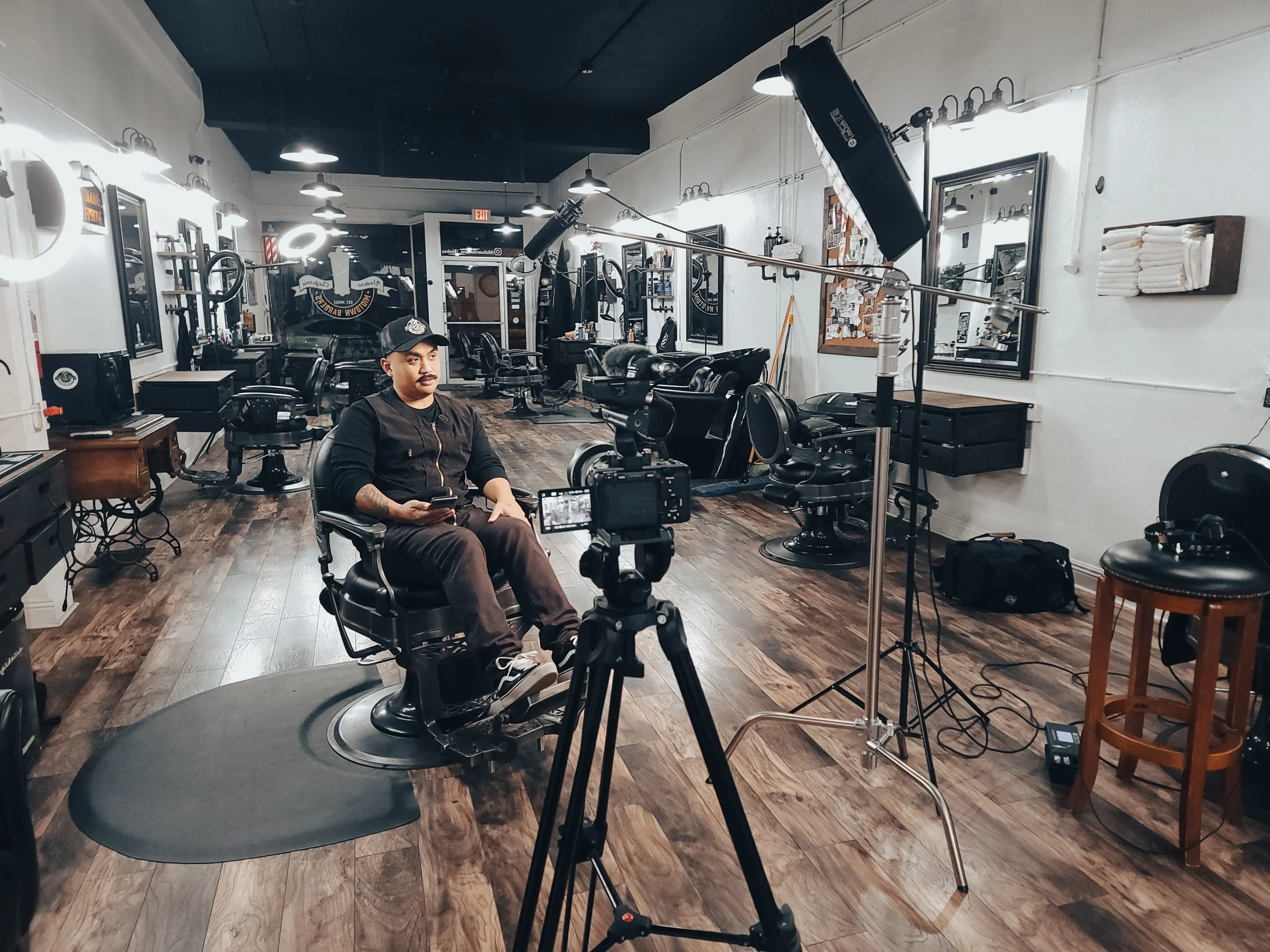 Arm & Camera filming a business content production at Midtown Barbers