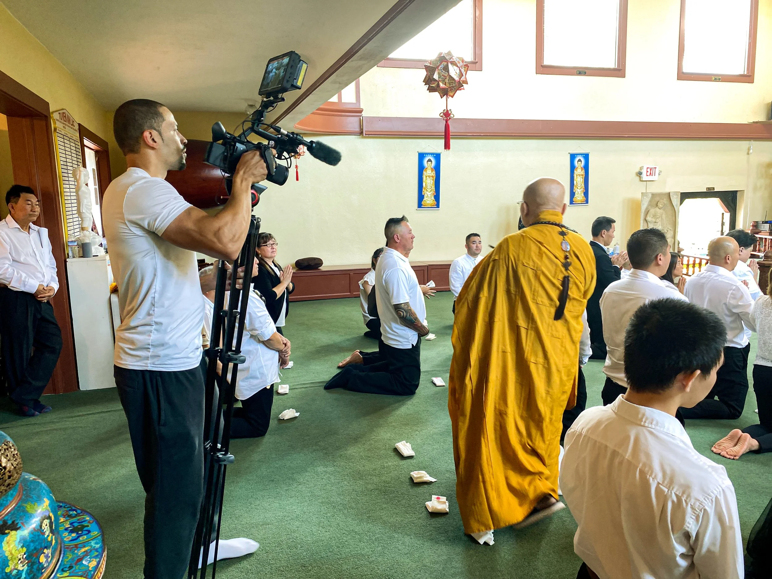 Arm & Camera videographer filming a live production