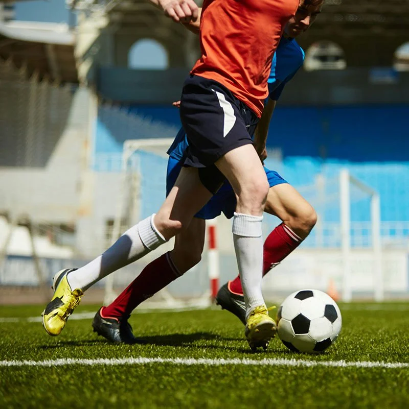 football players showing their reliance on flexible and healthy knee joints