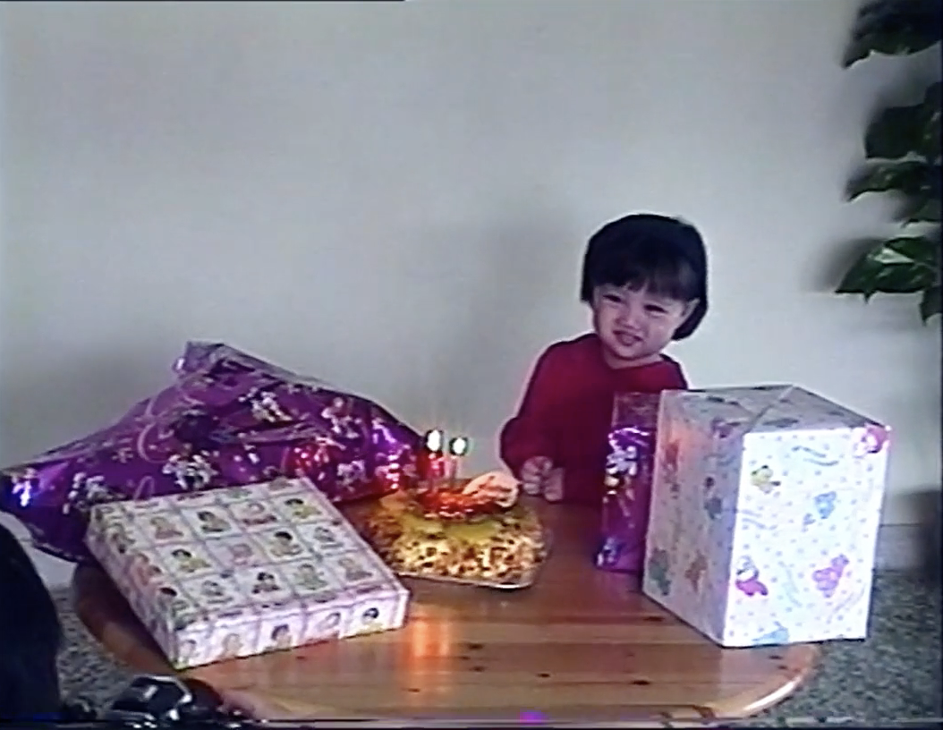 The Feeling of Being Close to You // Directed by Ash Goh Hua // In a reconciliatory phone conversation set to old home videos juxtaposed with footage of independent adult life, the filmmaker and their mother candidly discuss intergenerational trauma