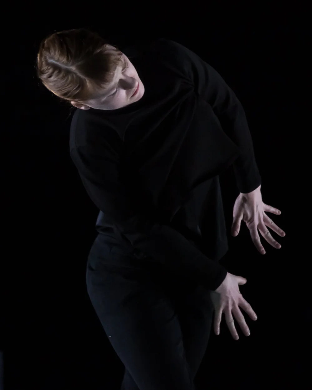  Sarah Fregeau posed beneath the camera, leaning to the side with her palm flat against her thigh.&nbsp; 