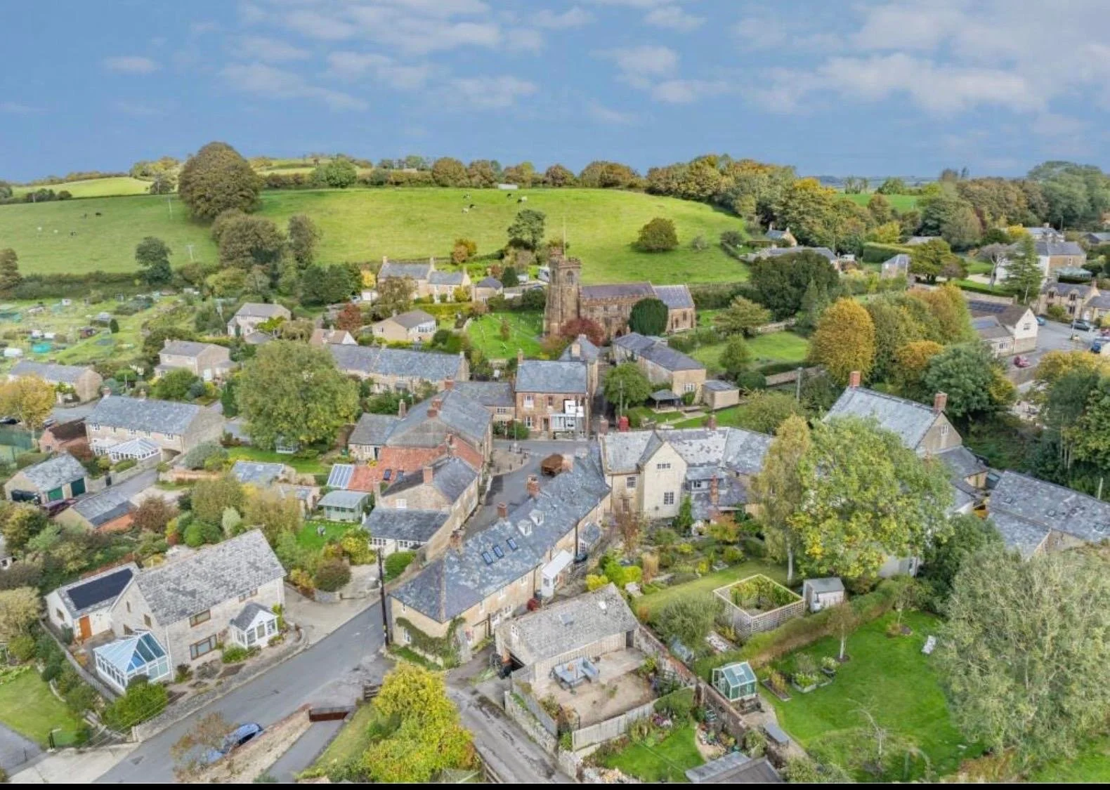 Broadwindsor village for above, village square, Dorset view, fields, listed buildings AONB