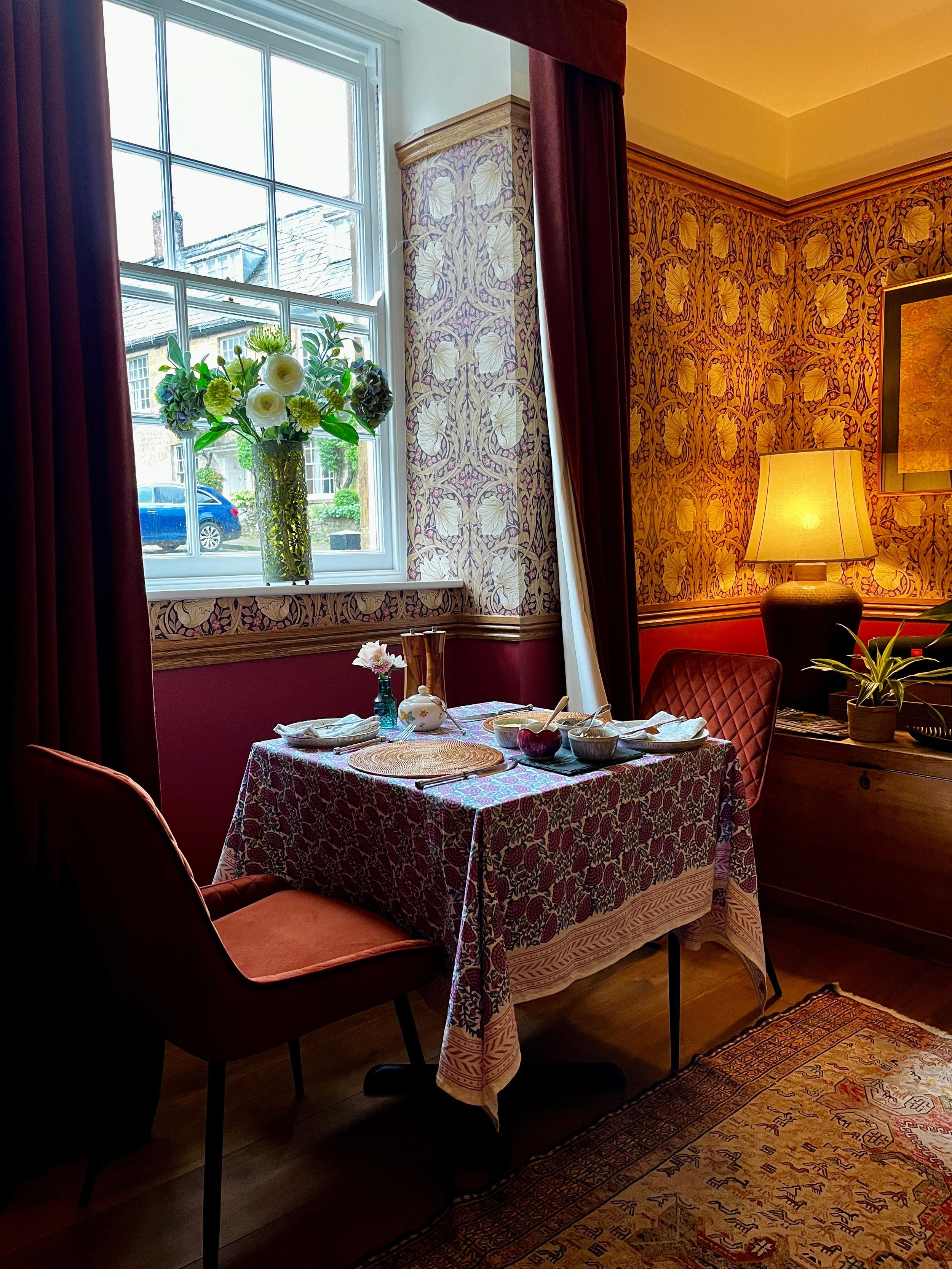 breakfast room at the old George, window looking out to the square, character lounge and exceptional dining experience
