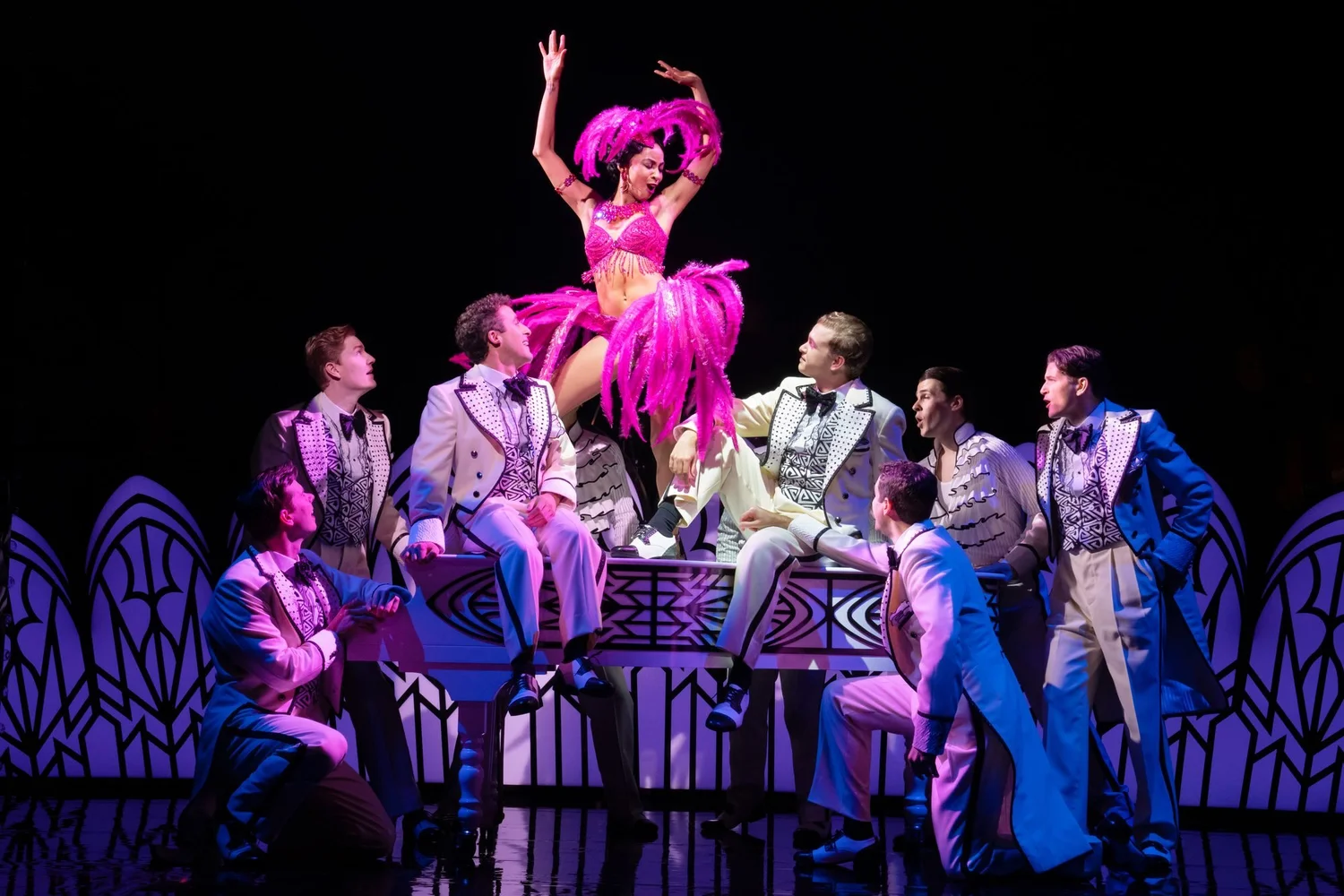 Allison Semmes as Josephine Baker and the company of Harmony