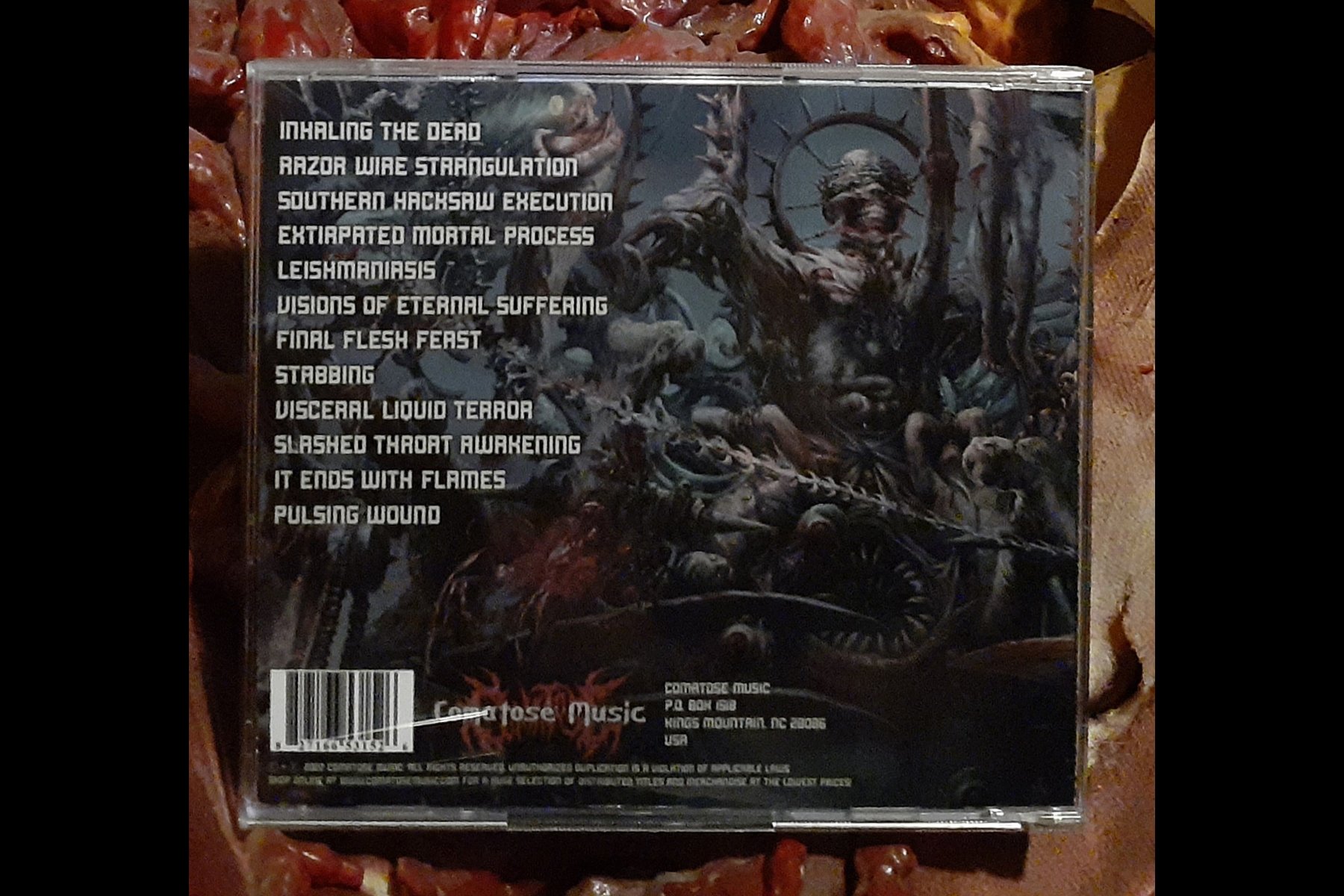 STABBING - Extirpated Mortal Process CD BACK.jpg