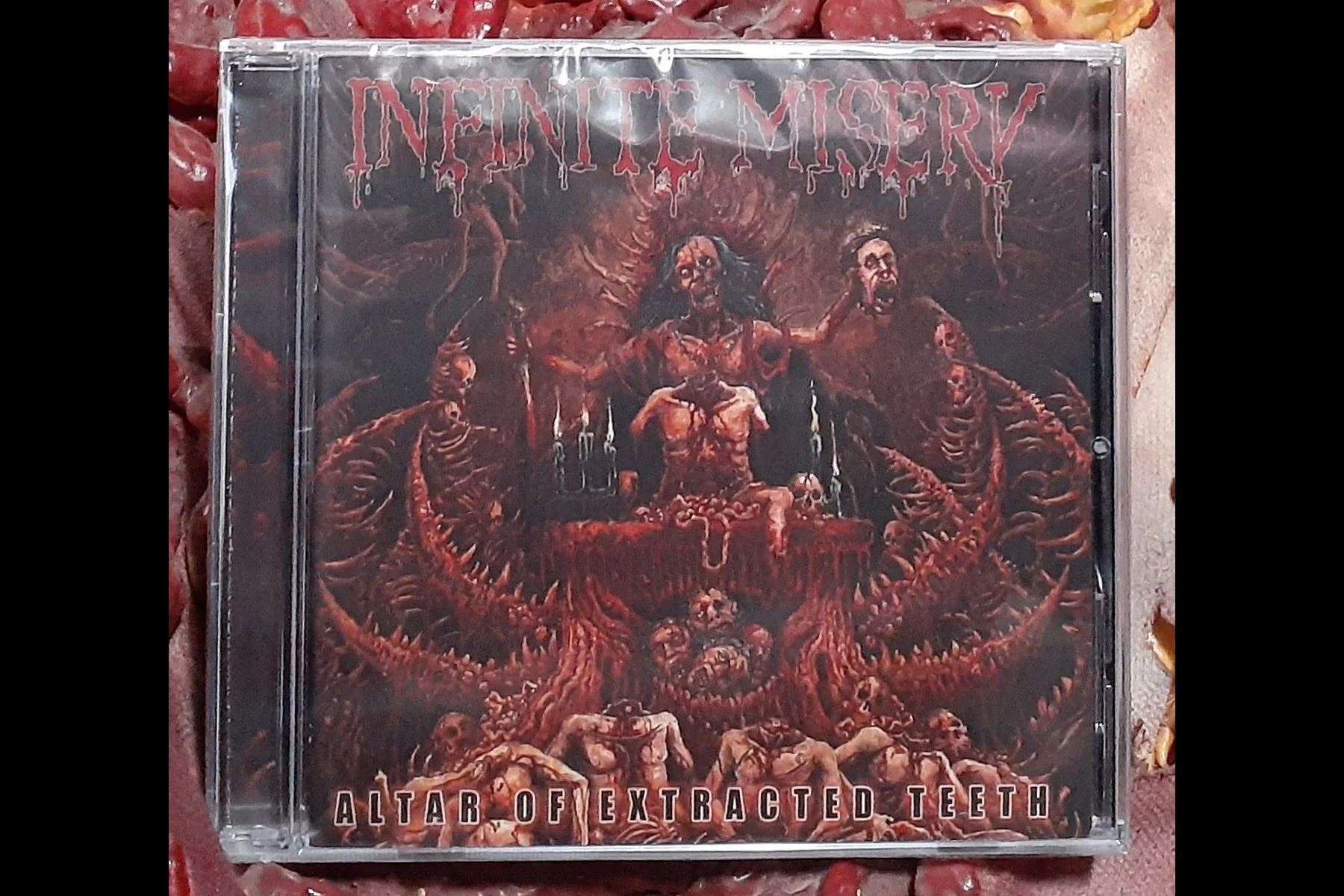 INFINITE MISERY - Altar of Extracted Teeth LTD MCD .jpg