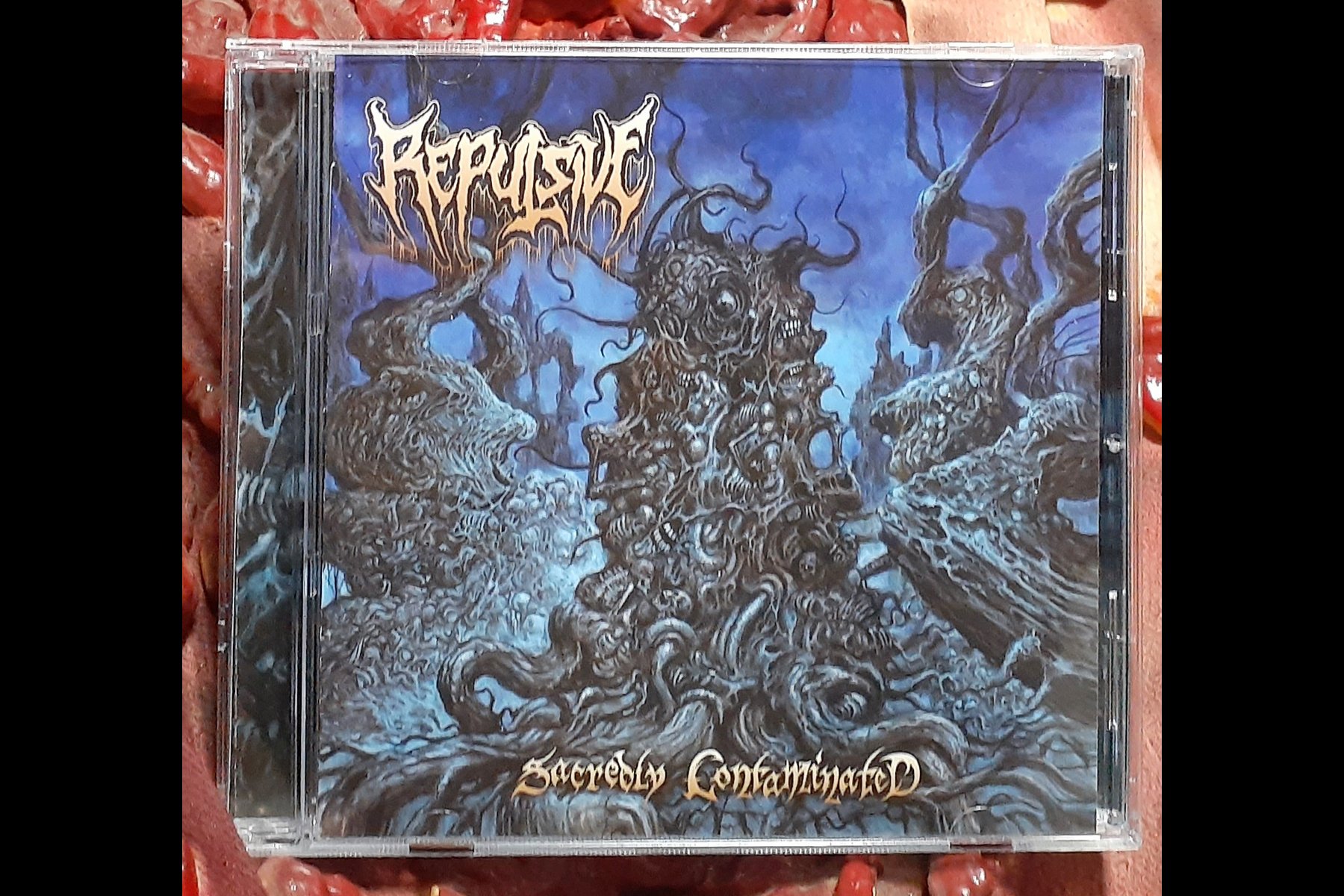 REPULSIVE – Sacredly Contaminated CD