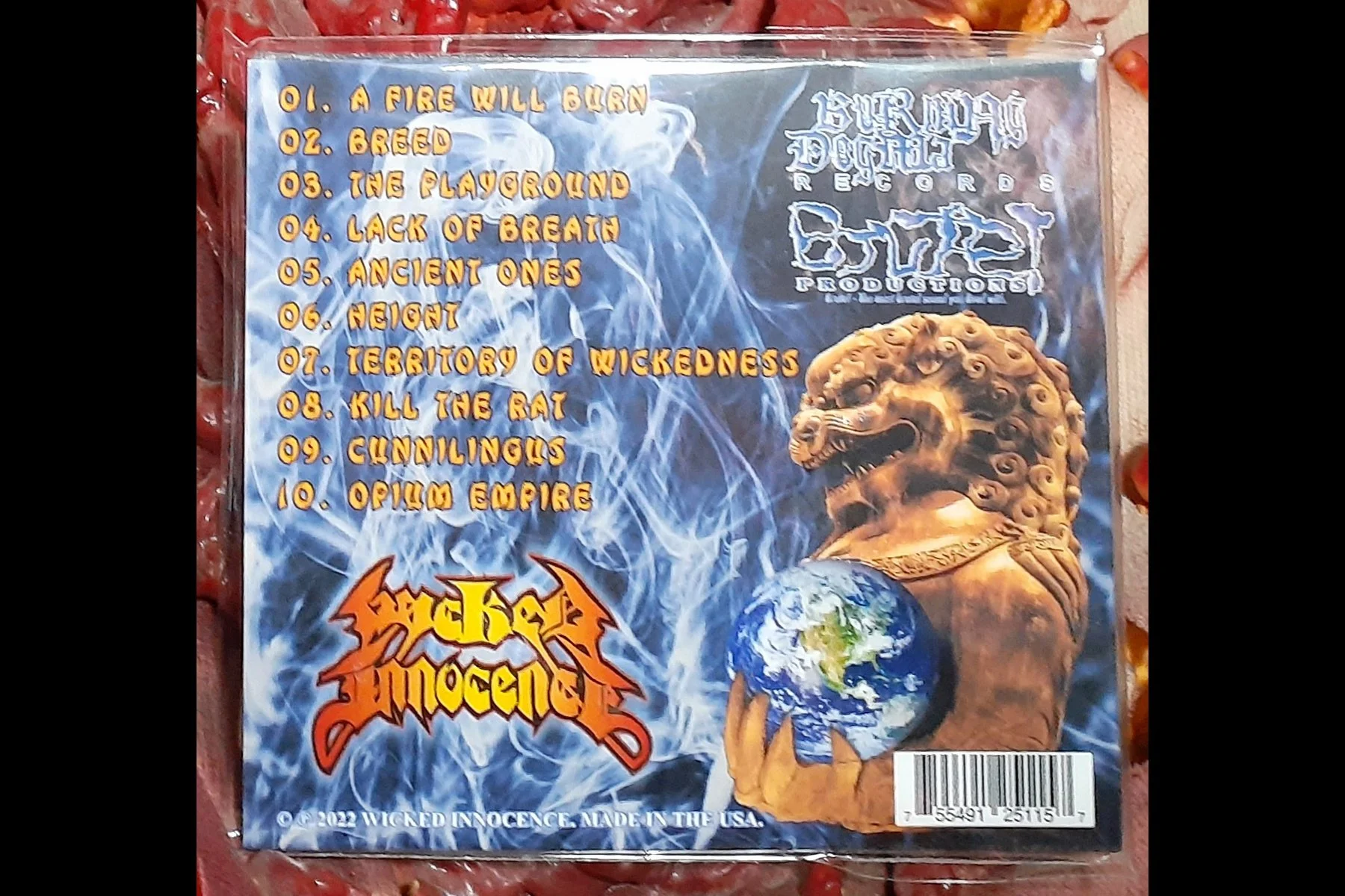 WICKED INNOCENCE - Opium Empire Digipack CD BACK.jpg