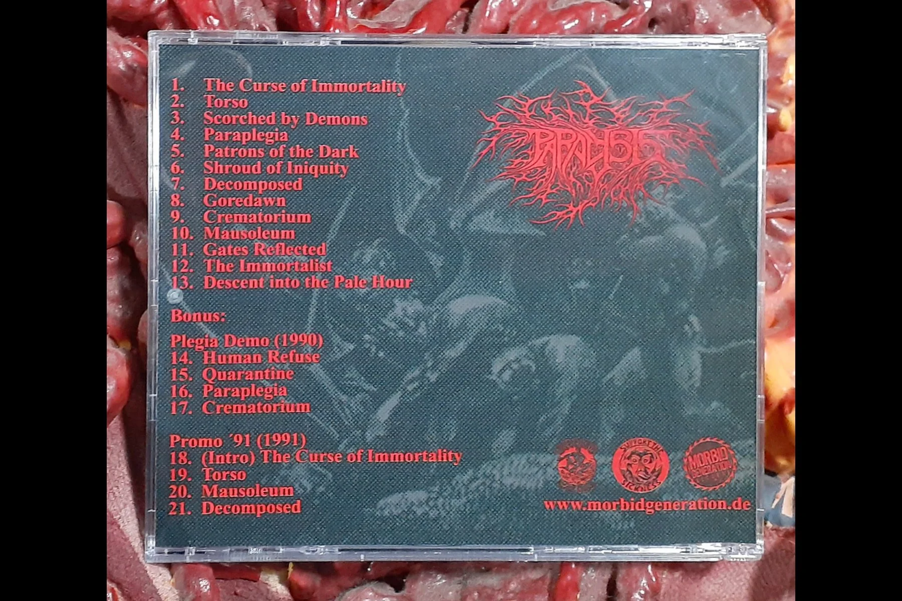 PARALYSIS - PATRONS OF THE DARK CD BACK.jpg
