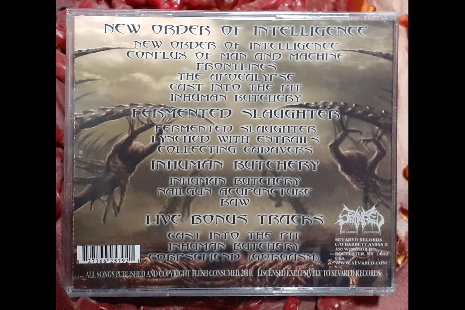 FLESH CONSUMED- Flesh Consumed Collection CD BACK.jpg