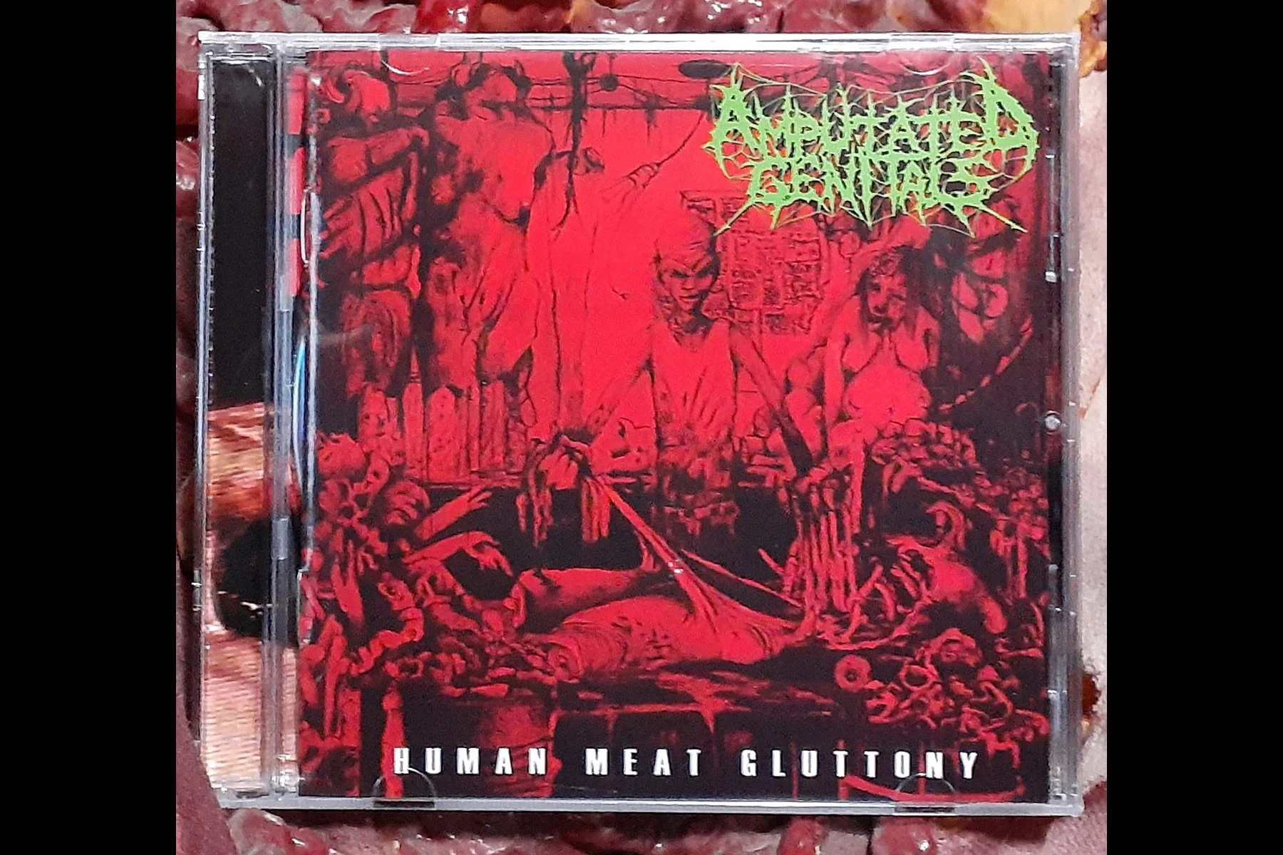 AMPUTATED GENITALS - Human Meat Gluttony CD.jpg