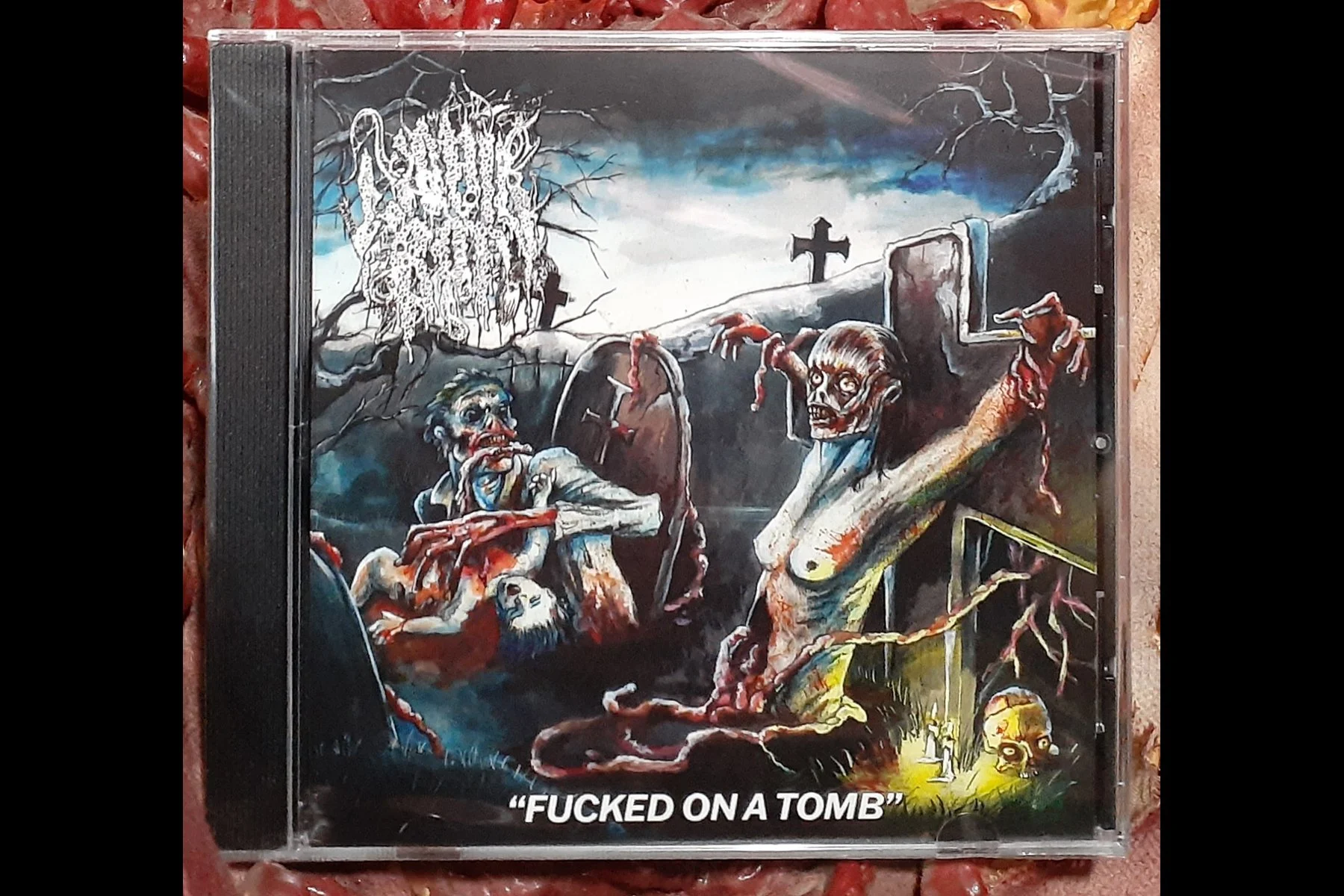 LIQUID ROT - Fucked on a Tomb MCD.jpg